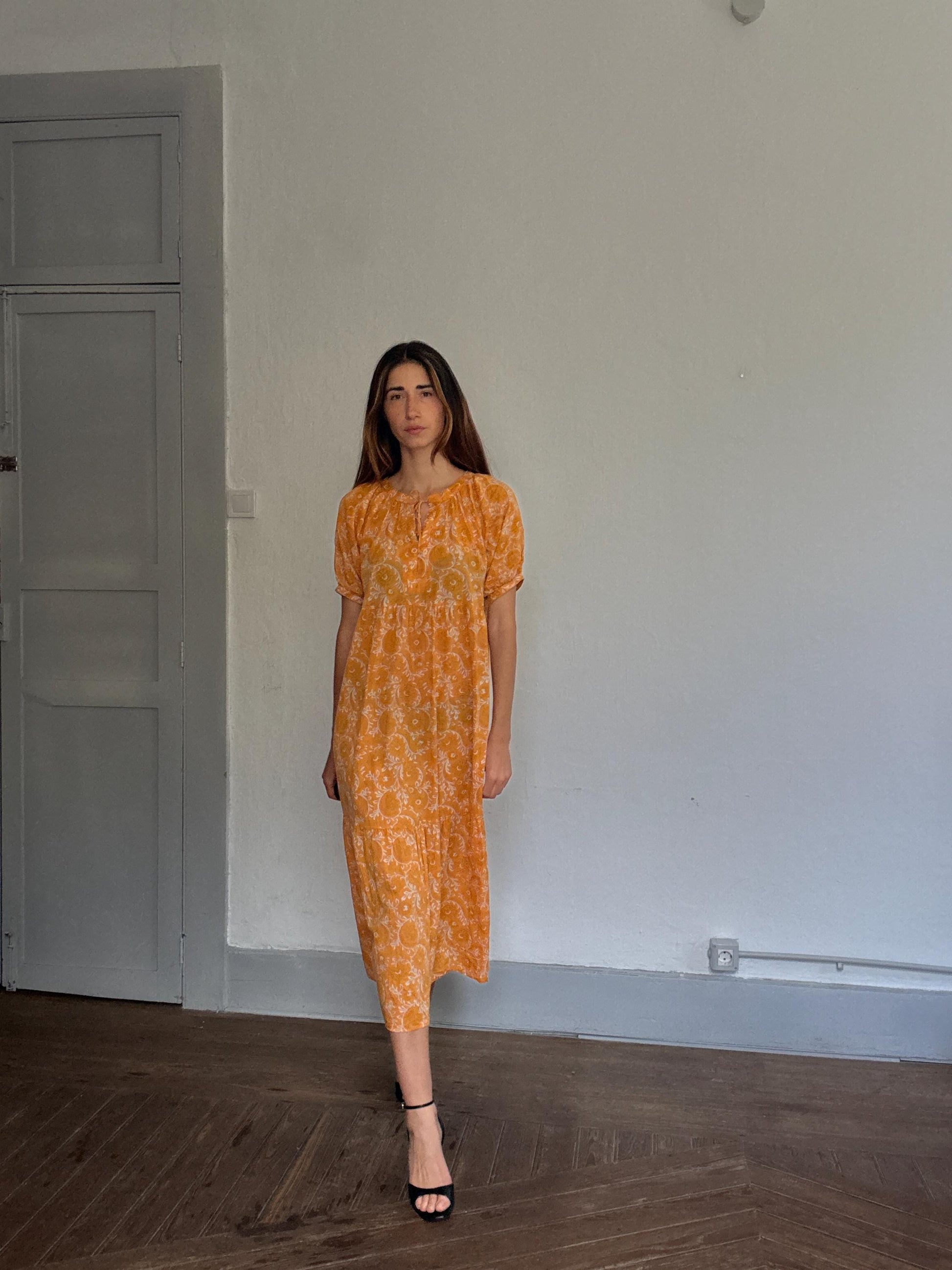 Natura floral maxi dress in 100% cotton – golden orange boho style, tiered silhouette, relaxed summer fit