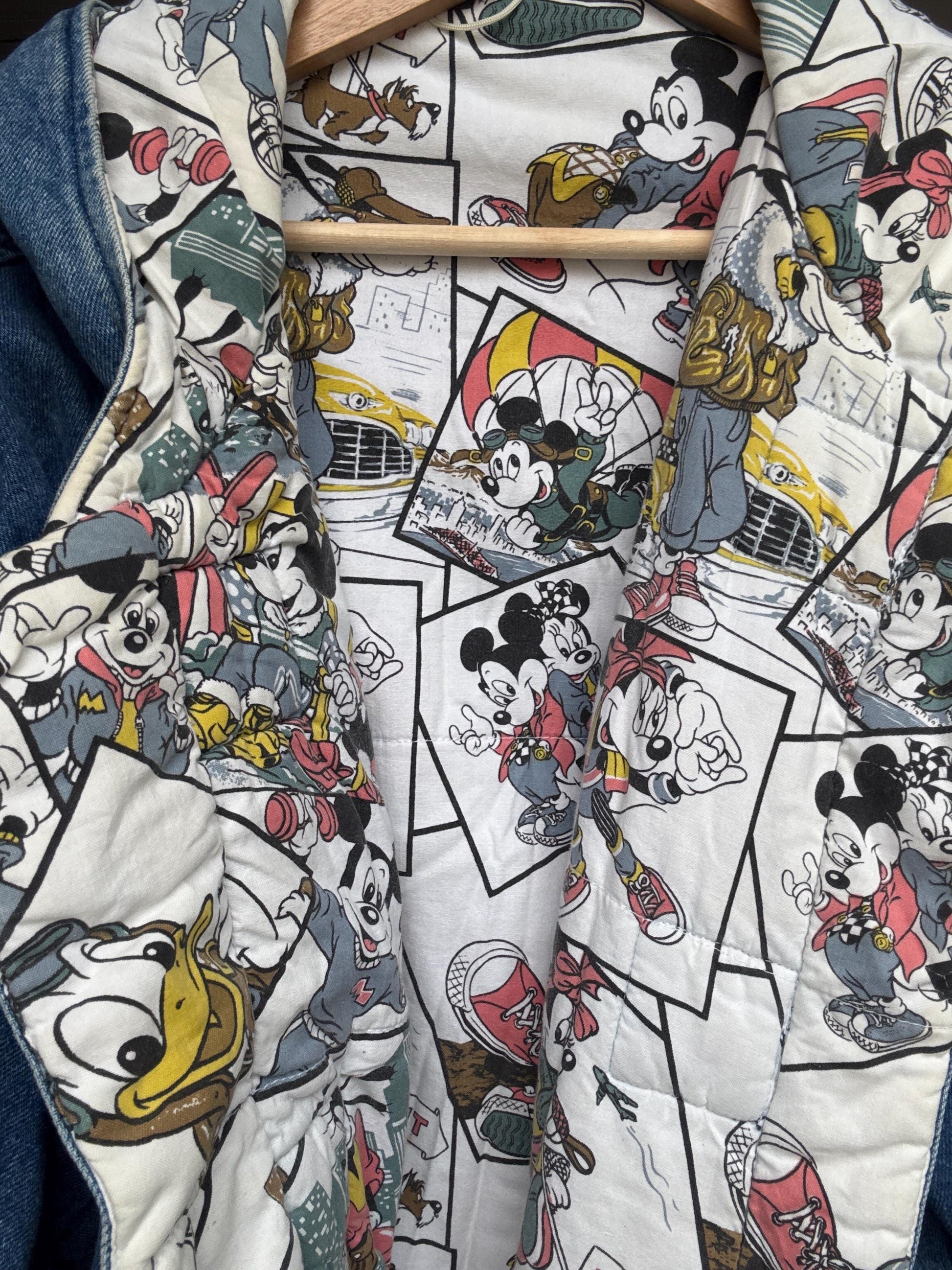 Rare vintage Mickey Mouse duffel coat – heavy cotton denim, cartoon print lining, toggle closure, warm padded Disney outerwear