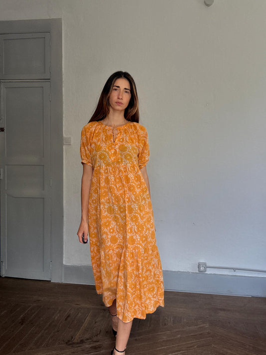 Natura floral maxi dress in 100% cotton – golden orange boho style, tiered silhouette, relaxed summer fit