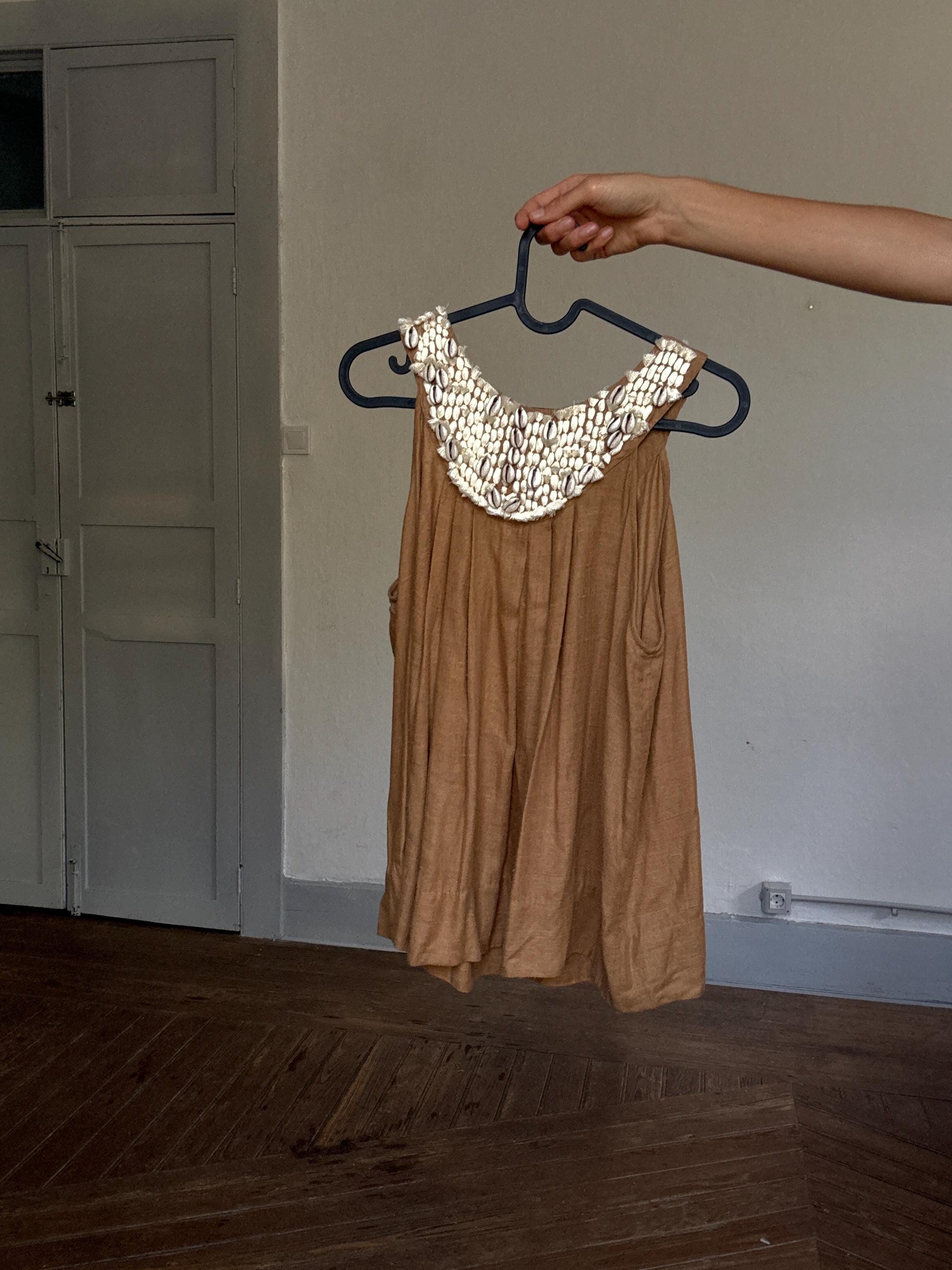 Boho beachy sleeveless top with real cowrie shell neckline – flowy earthy brown linen-style summer blouse