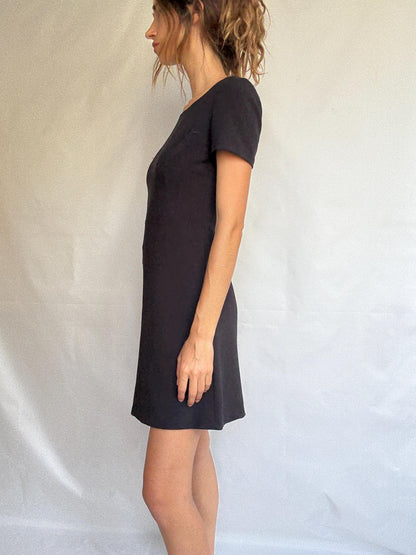 Minimalist Black Mini Dress In Soft Stretch — fabric close-up