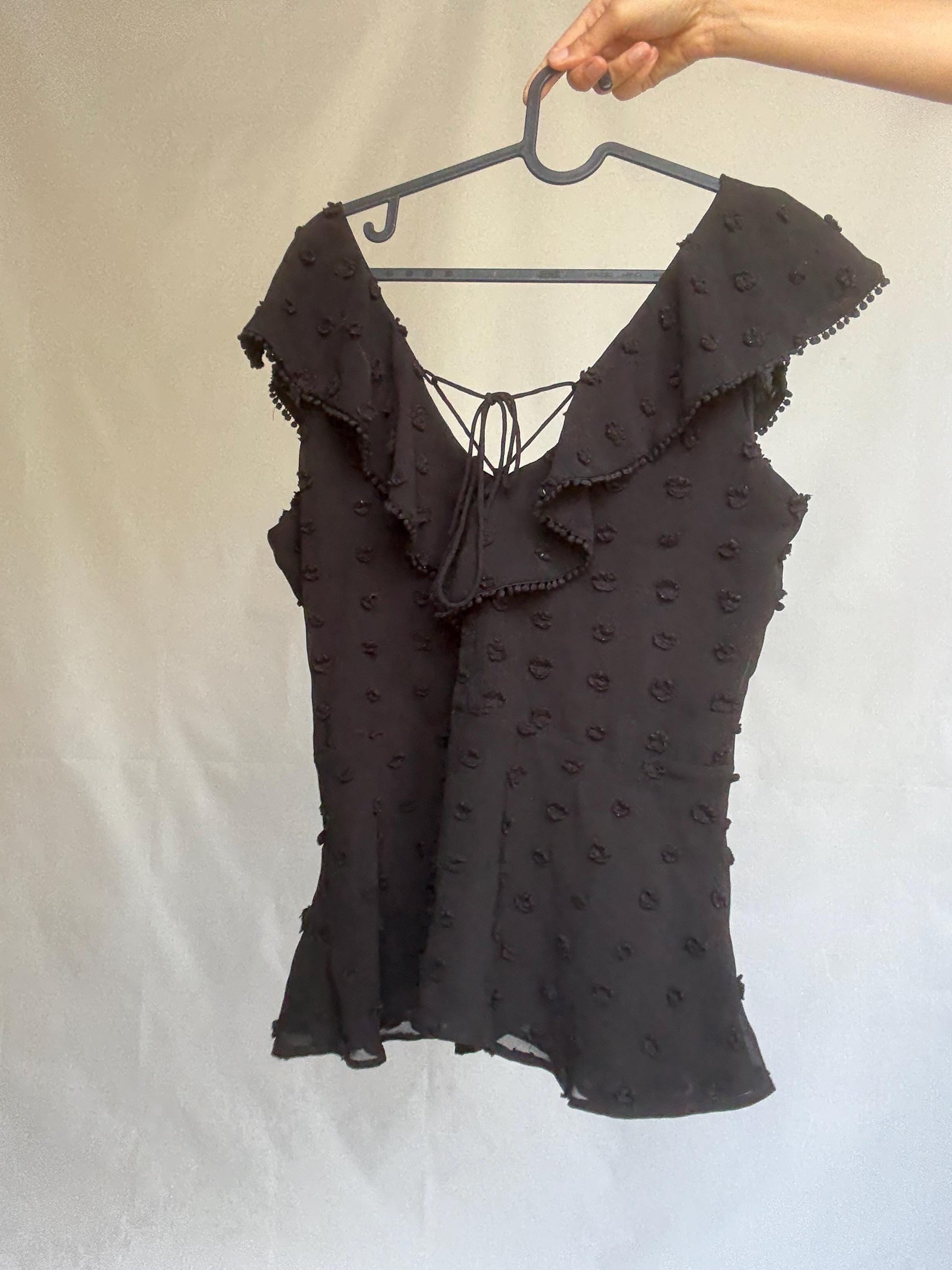 Uterqüe black blouse with ruffled back tie, textured dot fabric, romantic v-neck top with side zip, size M