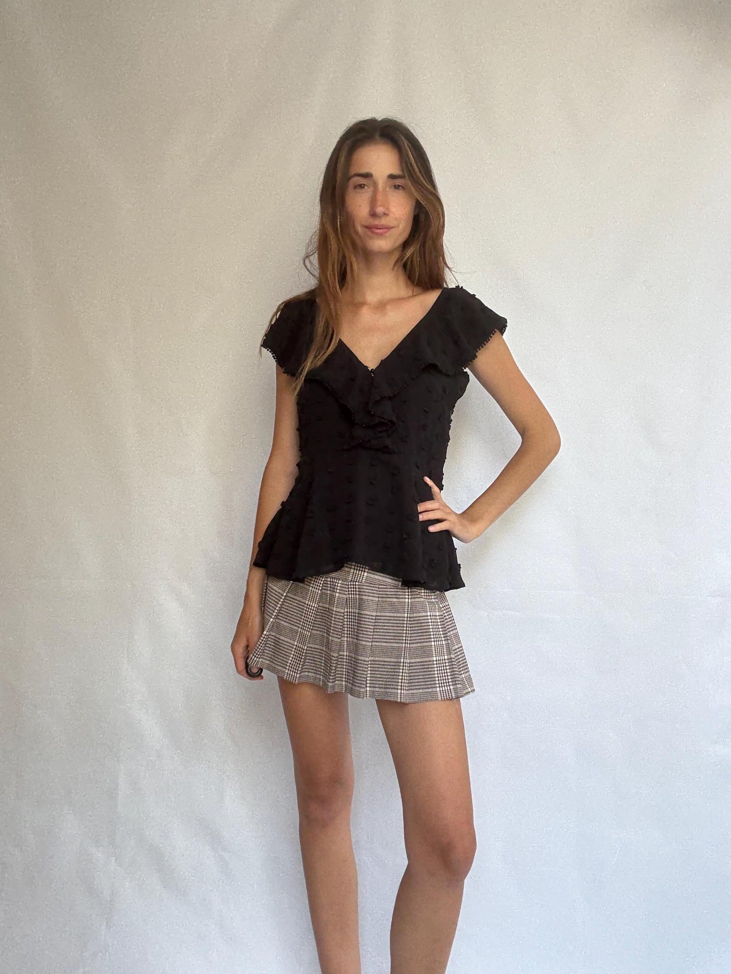 Uterqüe black blouse with ruffled back tie, textured dot fabric, romantic v-neck top with side zip, size M