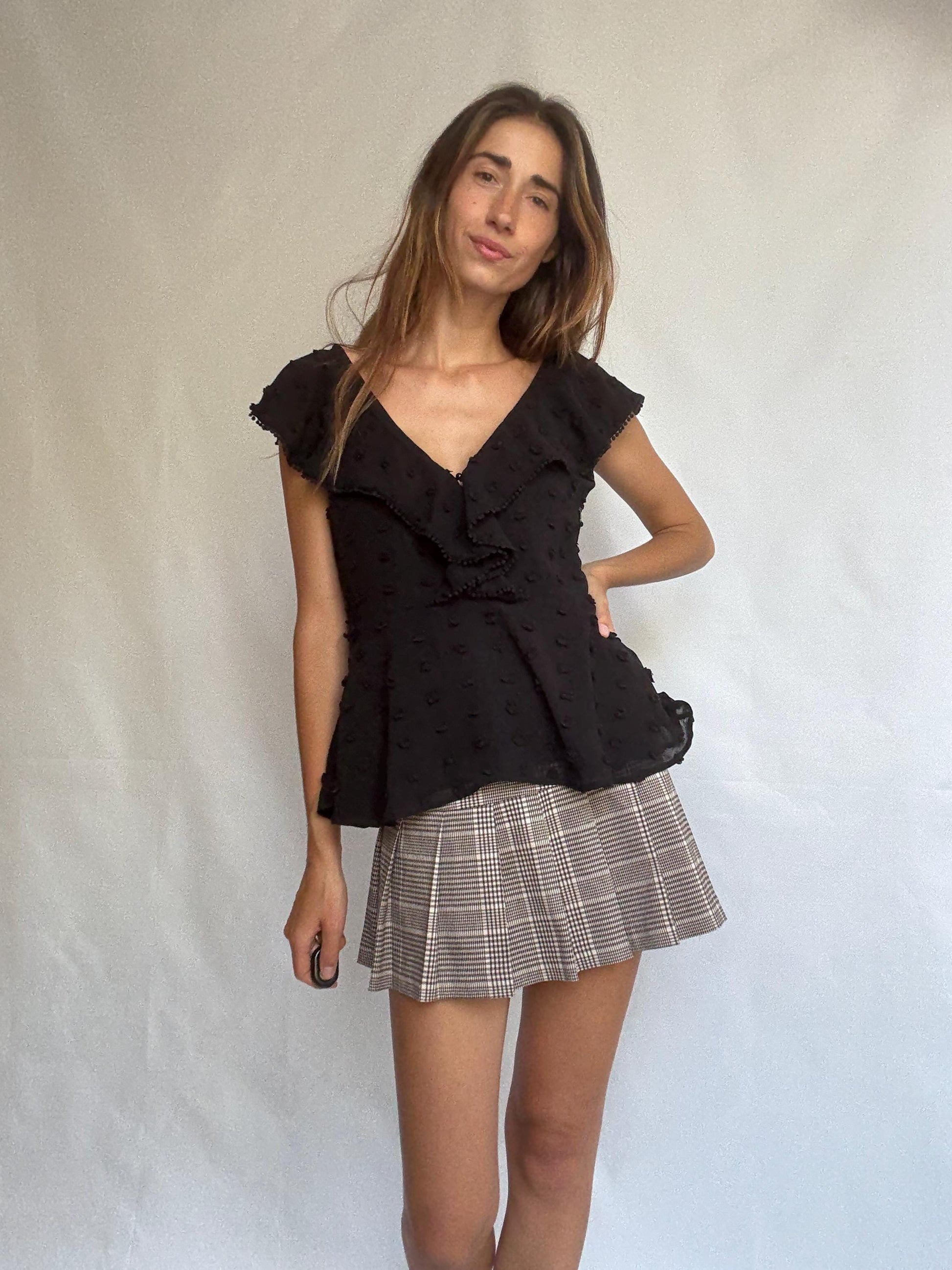 Uterqüe black blouse with ruffled back tie, textured dot fabric, romantic v-neck top with side zip, size M