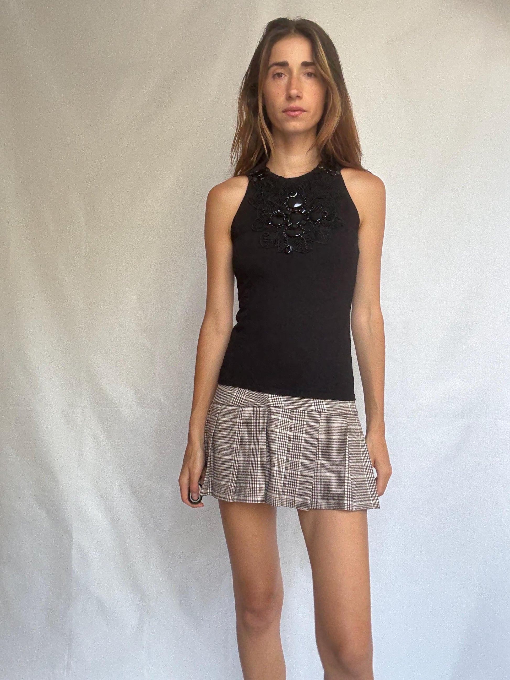 Leo Guy black sleeveless top with statement beaded neckline, elegant fitted blouse, size M/L, floral embroidery detail