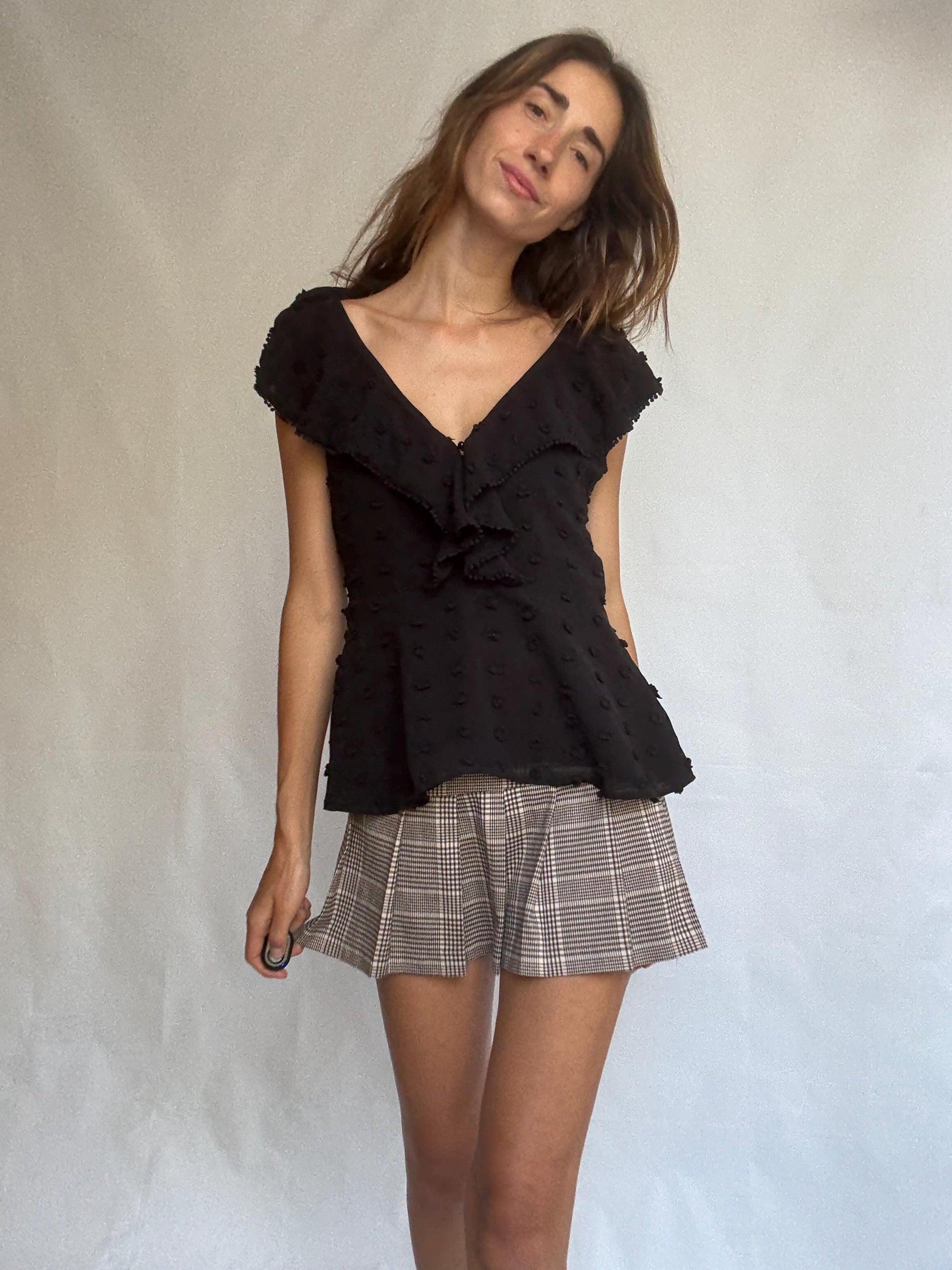 Uterqüe black blouse with ruffled back tie, textured dot fabric, romantic v-neck top with side zip, size M