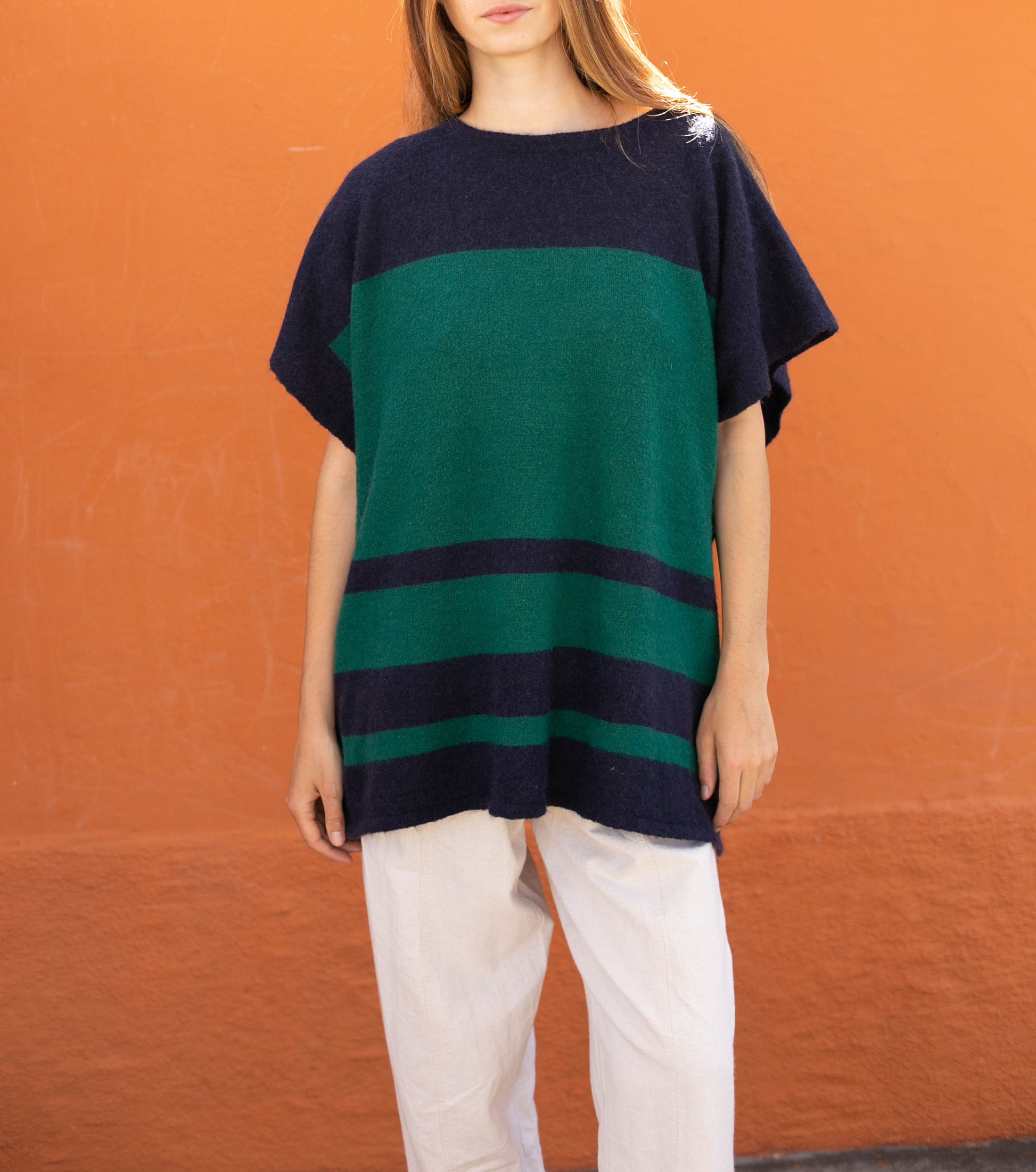 Wool poncho in navy blue and green