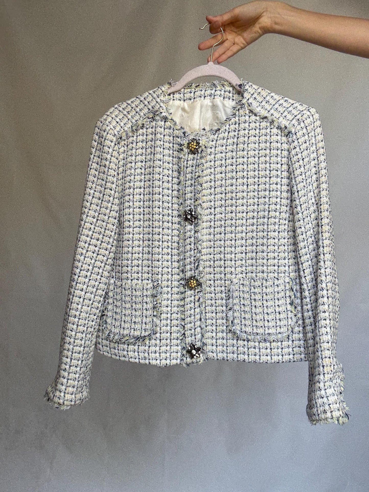 Elegant tweed-style cropped jacket with floral crystal buttons, cream check pattern, lined, 2 front pockets, classic fit