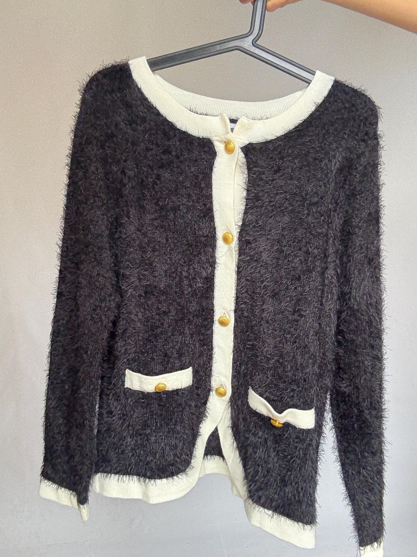 Vintage-Inspired Black and White Cardigan — fabric close-up