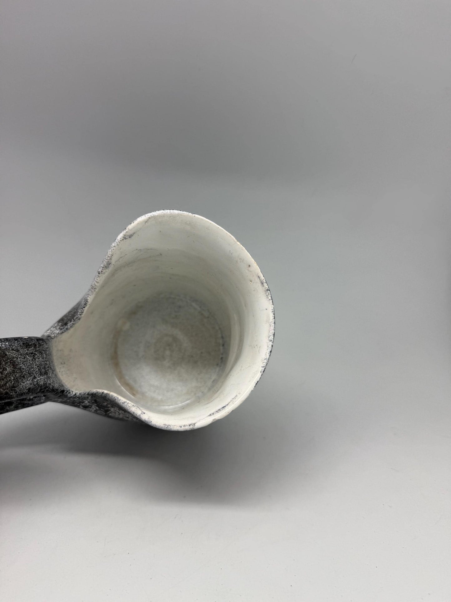 Vintage charcoal speckled ceramic creamer pitcher – sculptural swirl handle – 15cm tall – 10cm top width – rustic kitchen decor