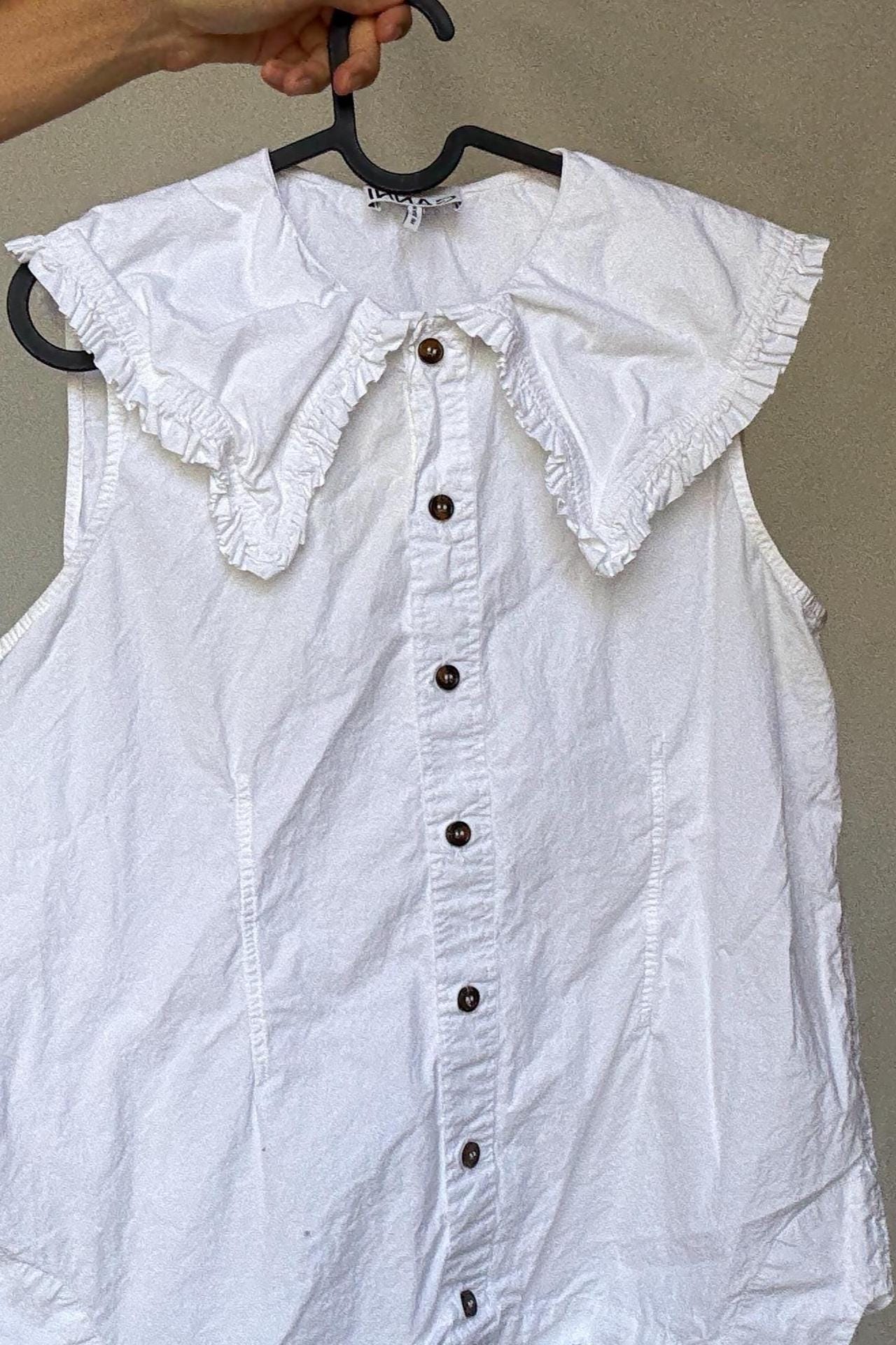 Ganni white ruffle collar blouse with flared shoulders and brown buttons – sleeveless cotton feel top US M cottagecore preppy vibe