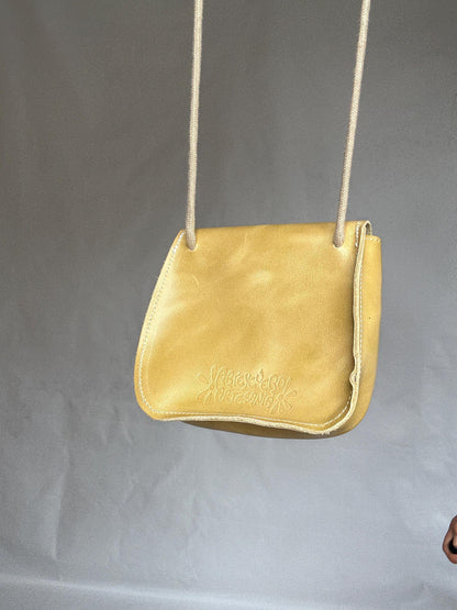 Y2K Yellow Leather Mini Purse with Blue Flower — fabric close-up