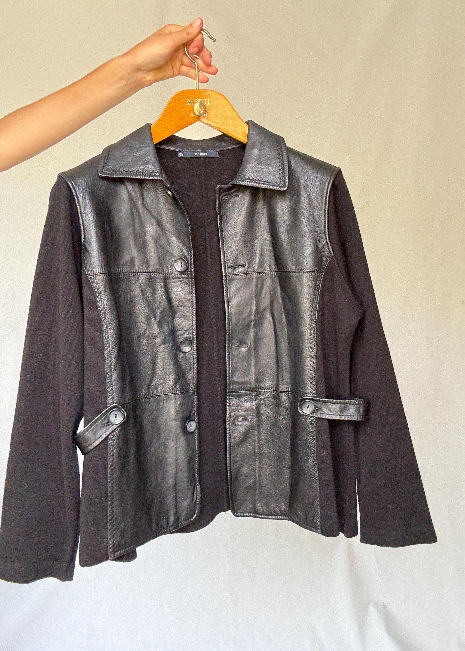 Luxury black leather and wool blend jacket, vintage minimalist style, high quality secondhand outerwear
