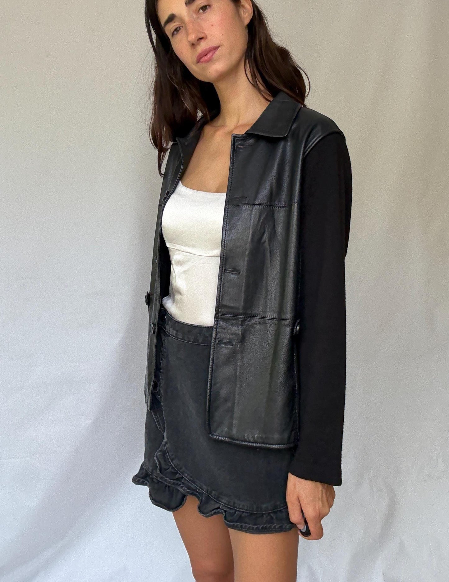 Luxury black leather and wool blend jacket, vintage minimalist style, high quality secondhand outerwear