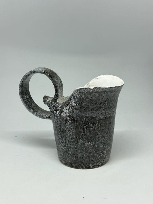 Vintage charcoal speckled ceramic creamer pitcher – sculptural swirl handle – 15cm tall – 10cm top width – rustic kitchen decor