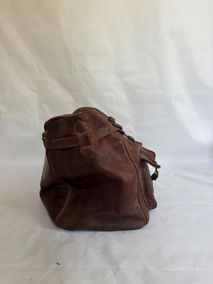Vintage Distressed Leather Travel Bag — fabric close-up