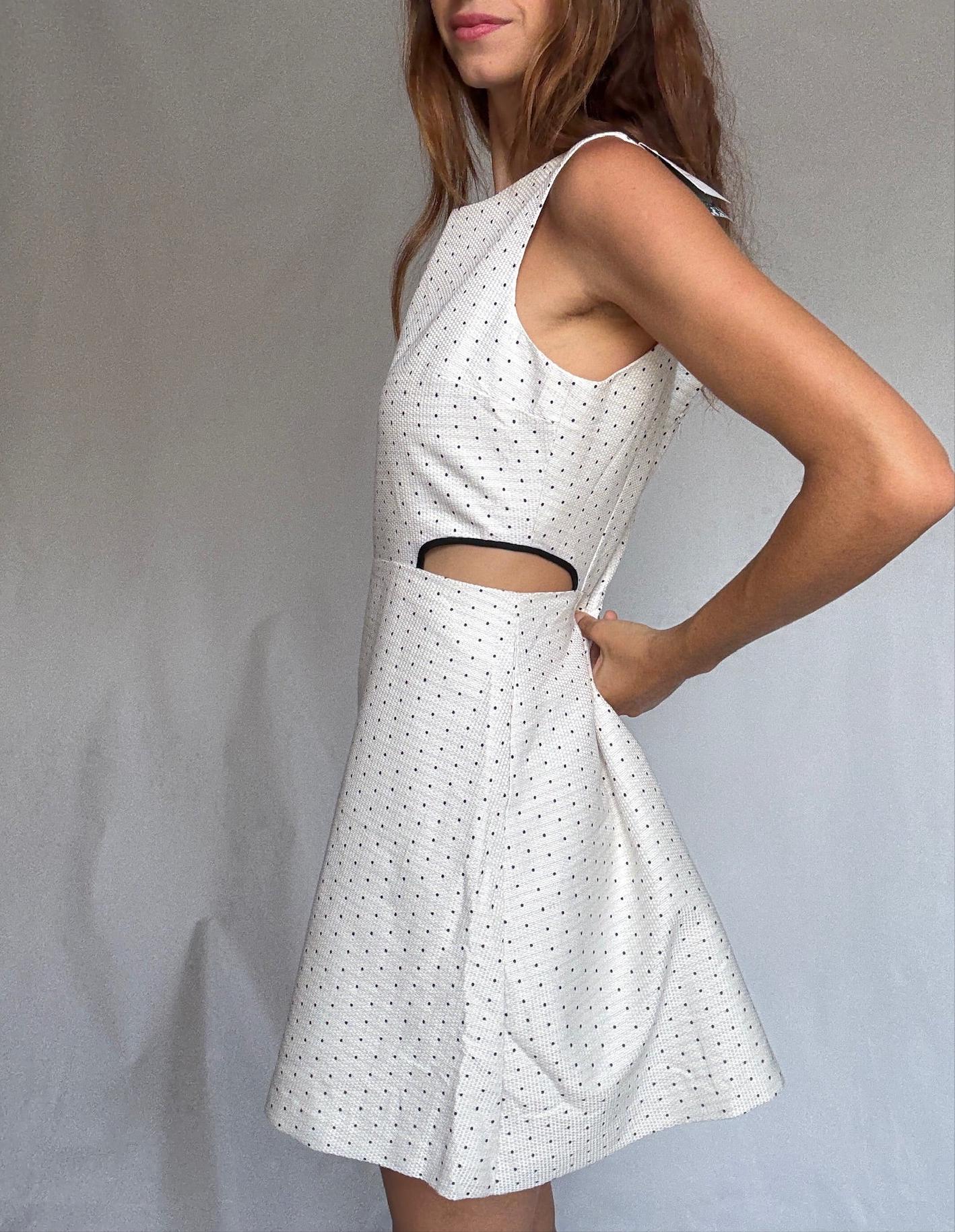 Naf Naf cotton mini dress with side cutouts and back zip US letter size M White with navy dots, structured sleeveless fit