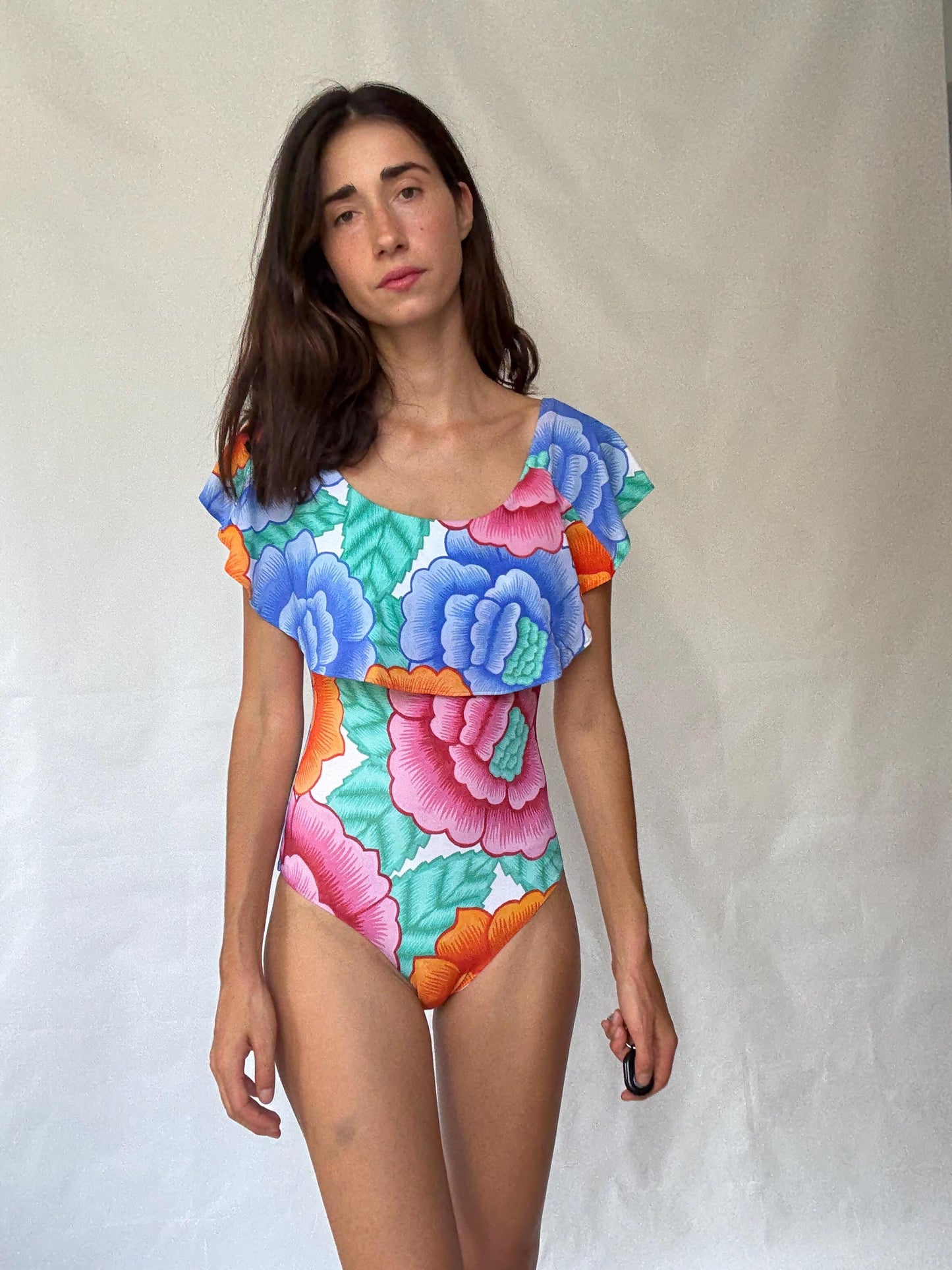 Retro floral one, piece swimsuit, scoop neckline, ruffled shoulder overlay, vibrant floral print, bohemian style, US M