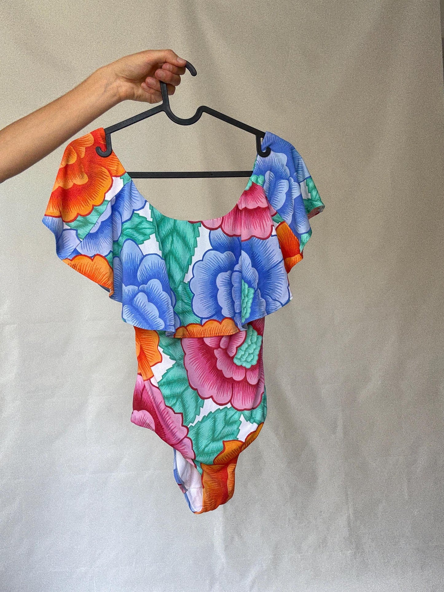 Retro floral one, piece swimsuit, scoop neckline, ruffled shoulder overlay, vibrant floral print, bohemian style, US M
