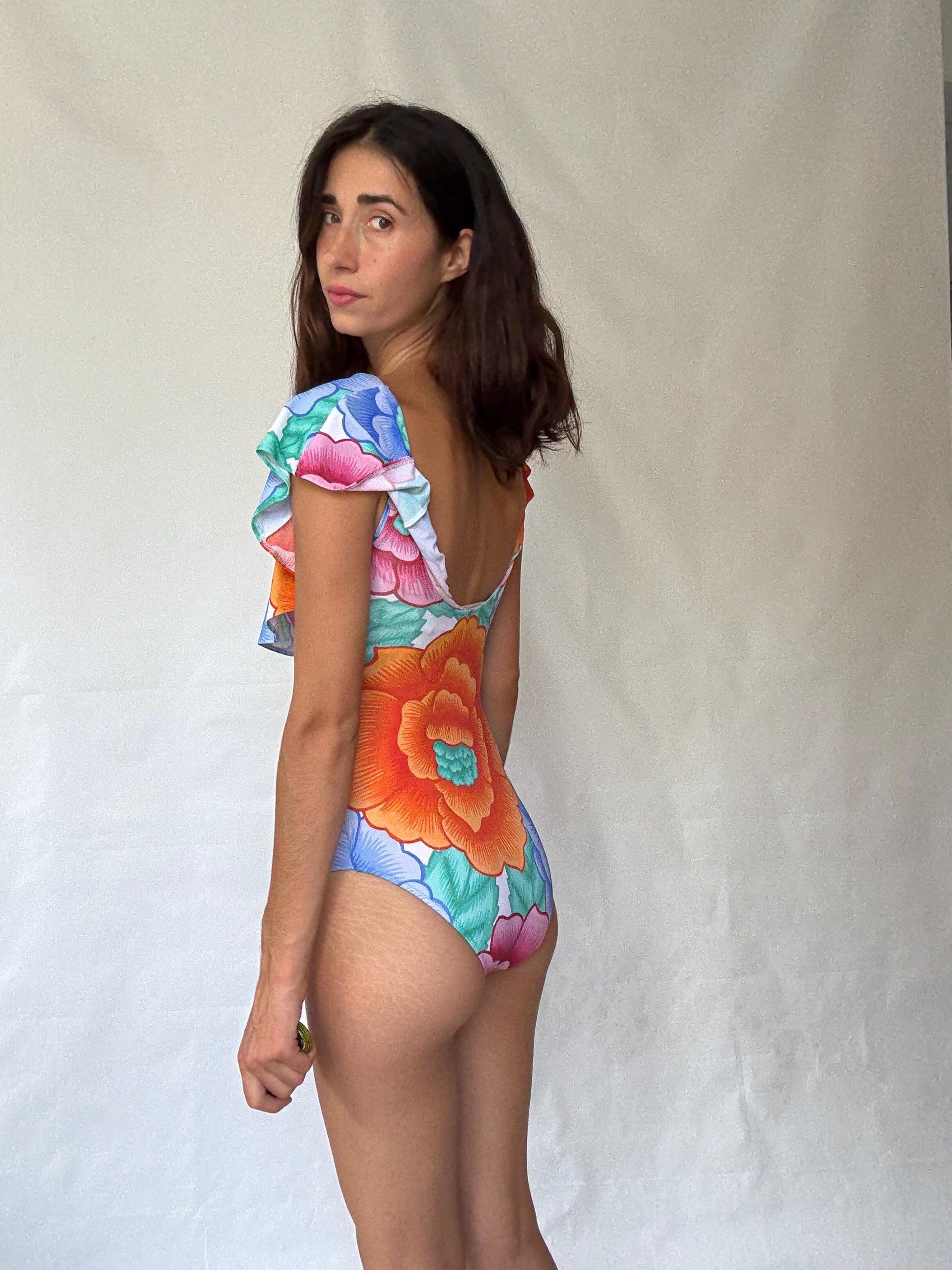 Retro floral one, piece swimsuit, scoop neckline, ruffled shoulder overlay, vibrant floral print, bohemian style, US M