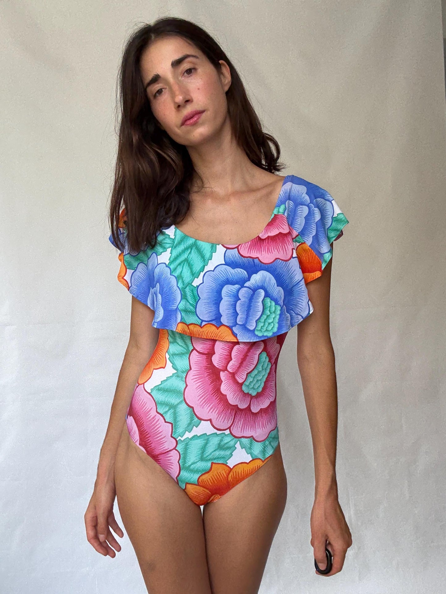 Retro floral one, piece swimsuit, scoop neckline, ruffled shoulder overlay, vibrant floral print, bohemian style, US M