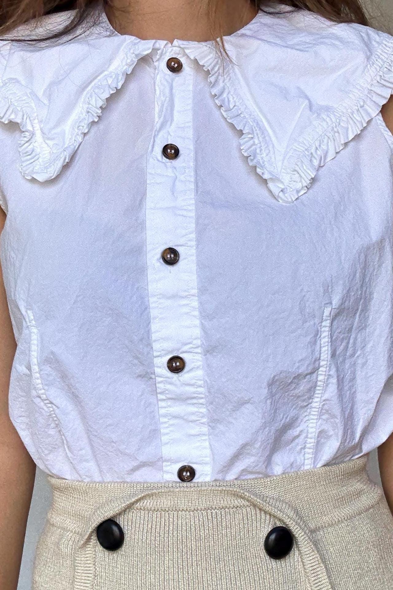 Ganni white ruffle collar blouse with flared shoulders and brown buttons – sleeveless cotton feel top US M cottagecore preppy vibe