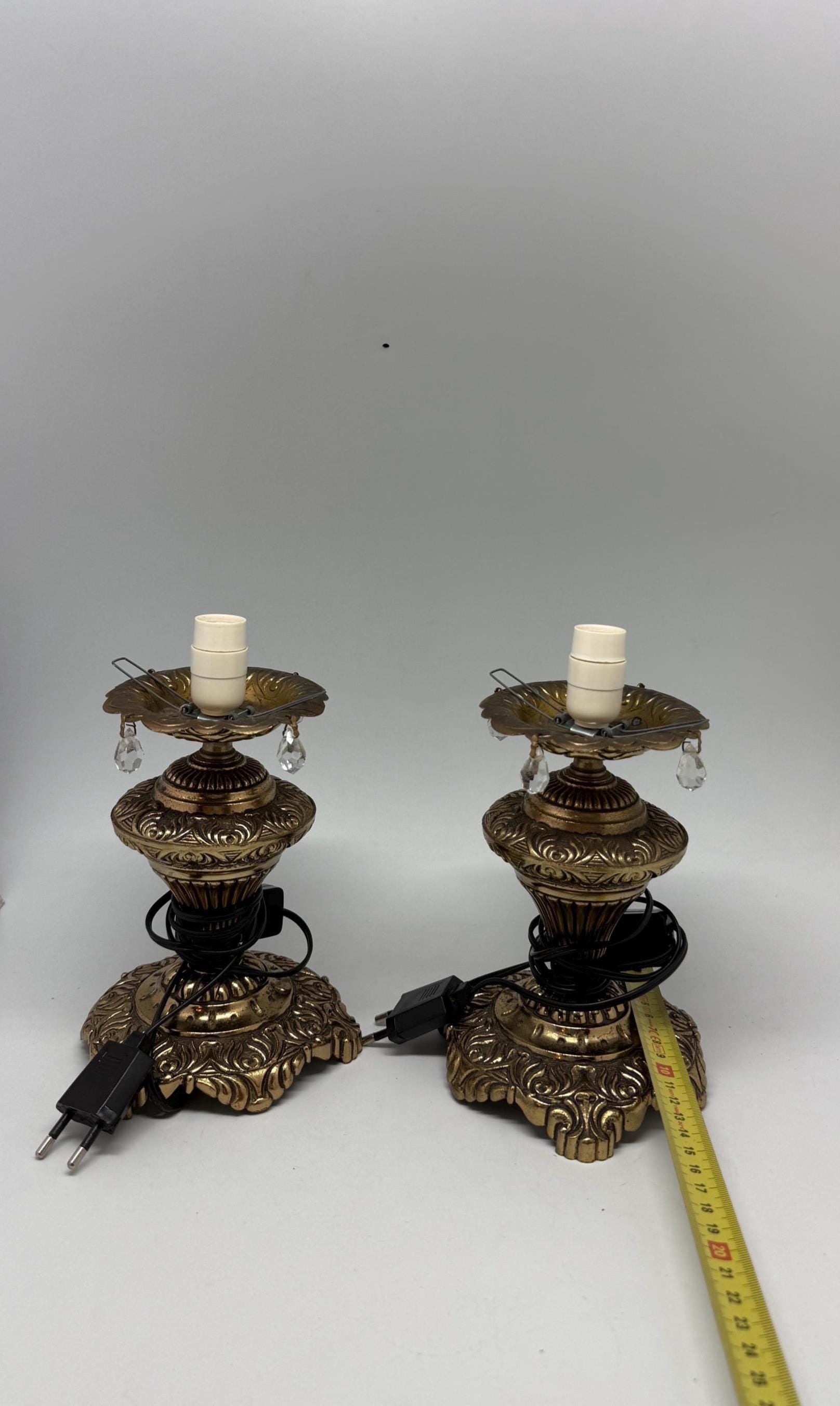 Vintage pair of ornate table lamps, metal with brass, tone finish, candle holders, hanging crystal accents, elegant antique style