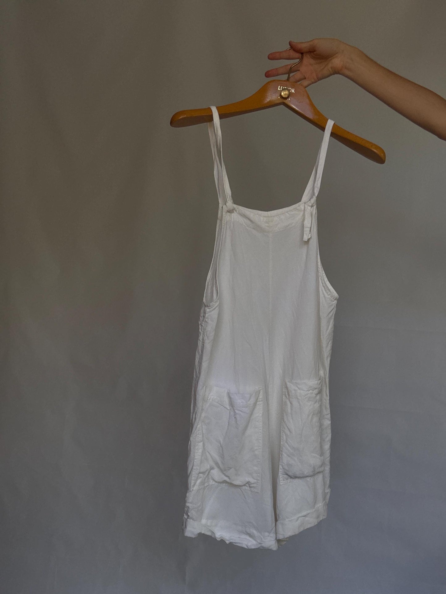 White sleeveless jumpsuit, US L, relaxed casual style