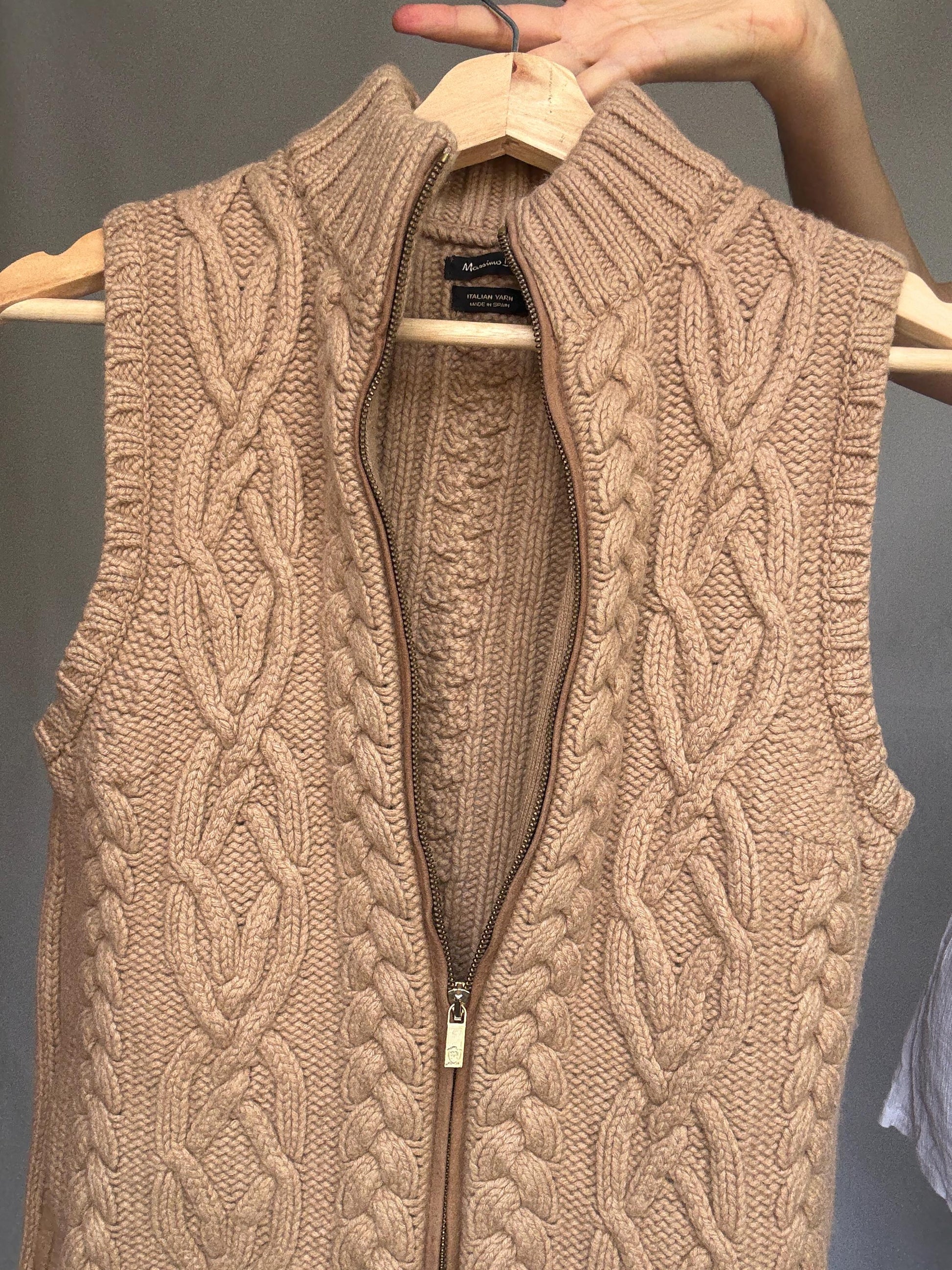 Massimo Dutti beige knit vest, wool Italian yarn, fitted silhouette, cable knit pattern, high ribbed collar, elegant Timothée Chalamet vibe