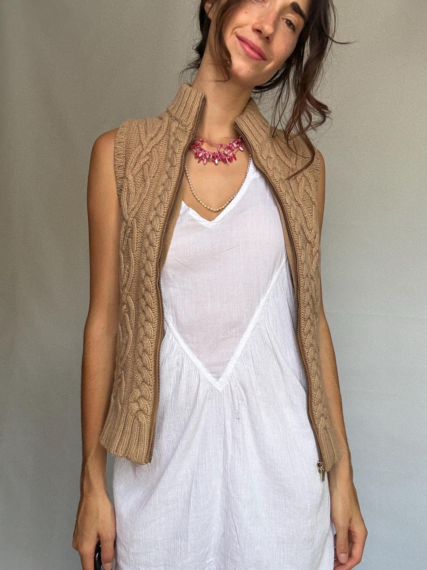 Massimo Dutti beige knit vest, wool Italian yarn, fitted silhouette, cable knit pattern, high ribbed collar, elegant Timothée Chalamet vibe