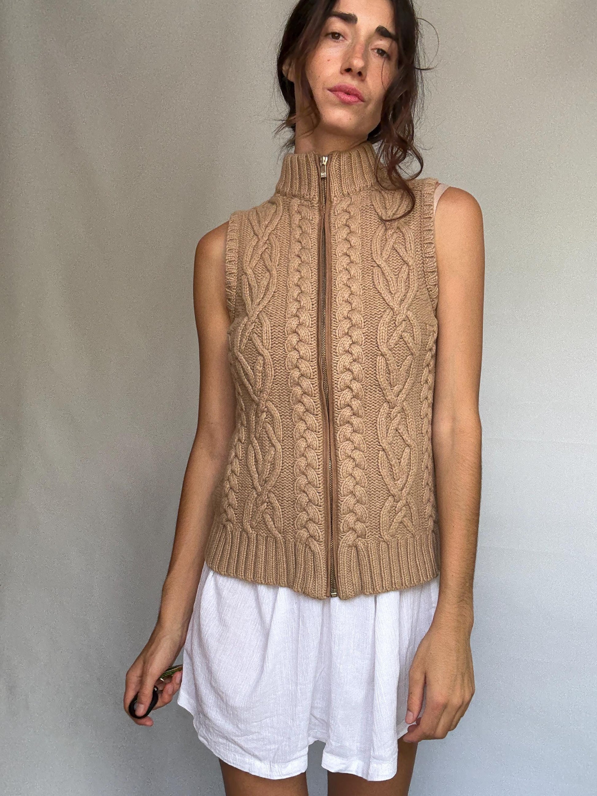 Massimo Dutti beige knit vest, wool Italian yarn, fitted silhouette, cable knit pattern, high ribbed collar, elegant Timothée Chalamet vibe