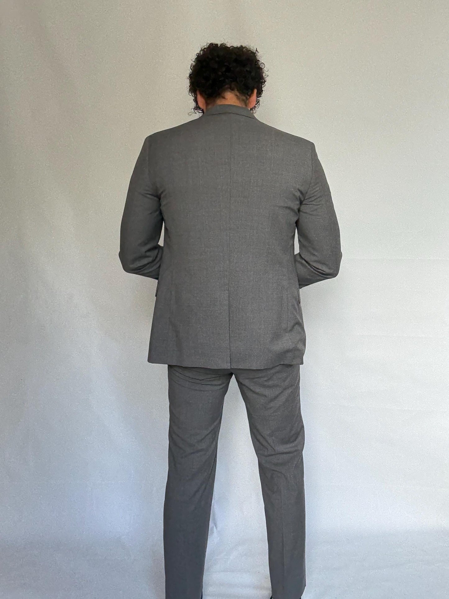 Calvin Klein gray suit, 100% wool, tailored fit, two, button blazer, slim fit trousers, minimalist elegant, US M, formal office wear