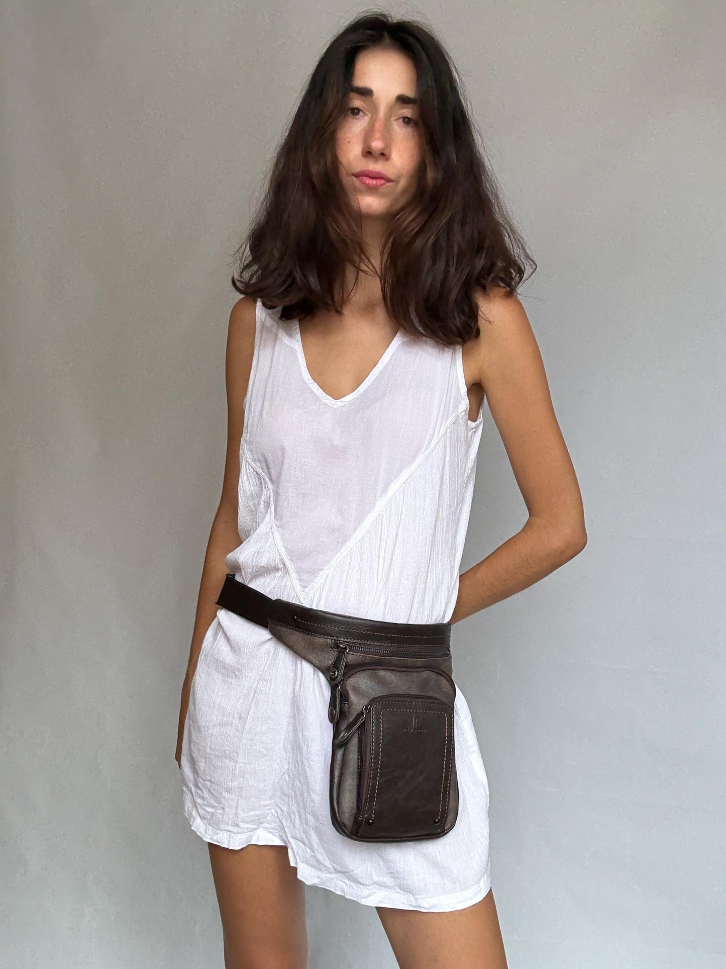 Brown leather crossbody belt bag, adjustable strap, double zip, versatile casual use fanny pack