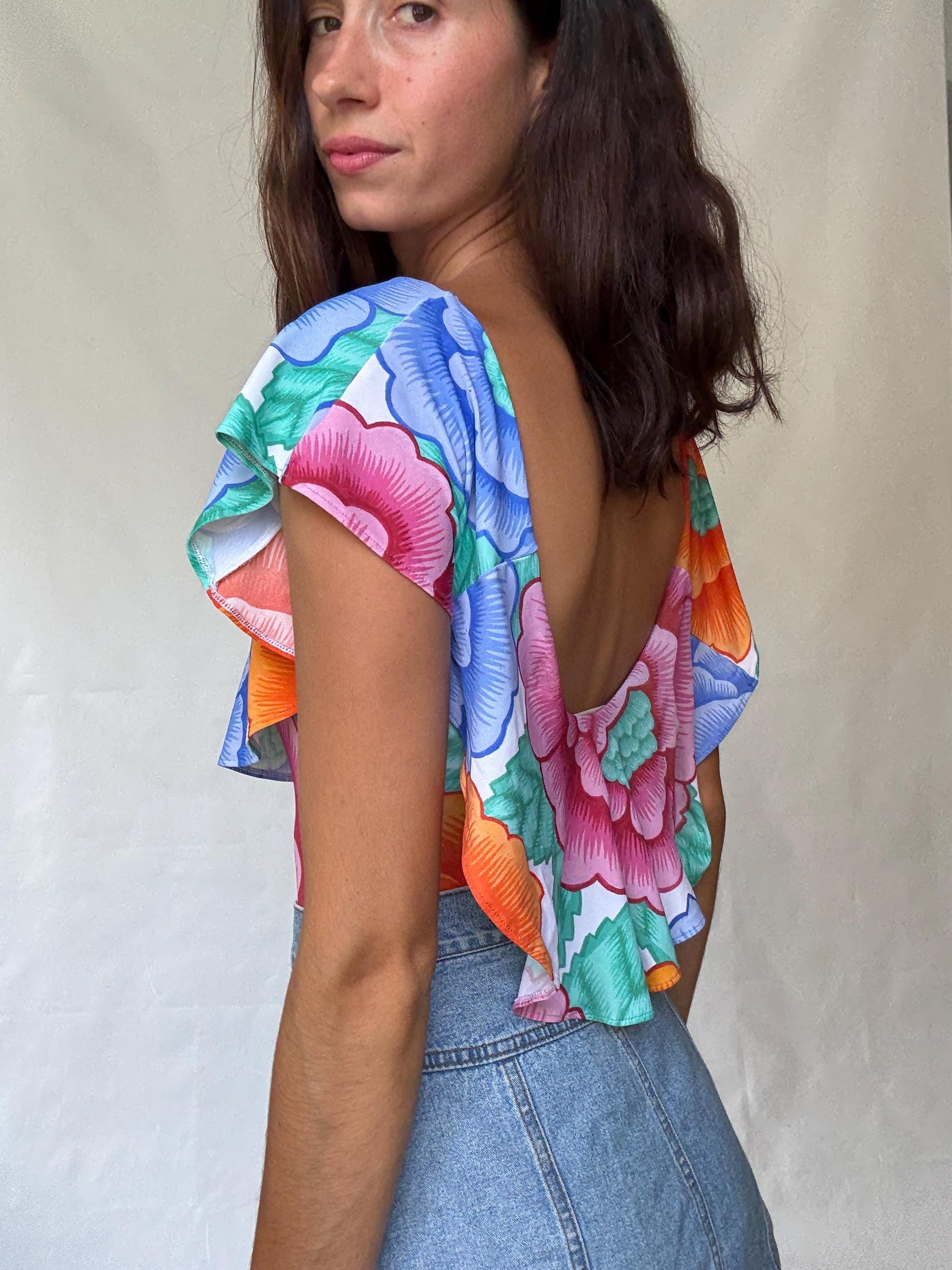 Retro floral one, piece swimsuit, scoop neckline, ruffled shoulder overlay, vibrant floral print, bohemian style, US M