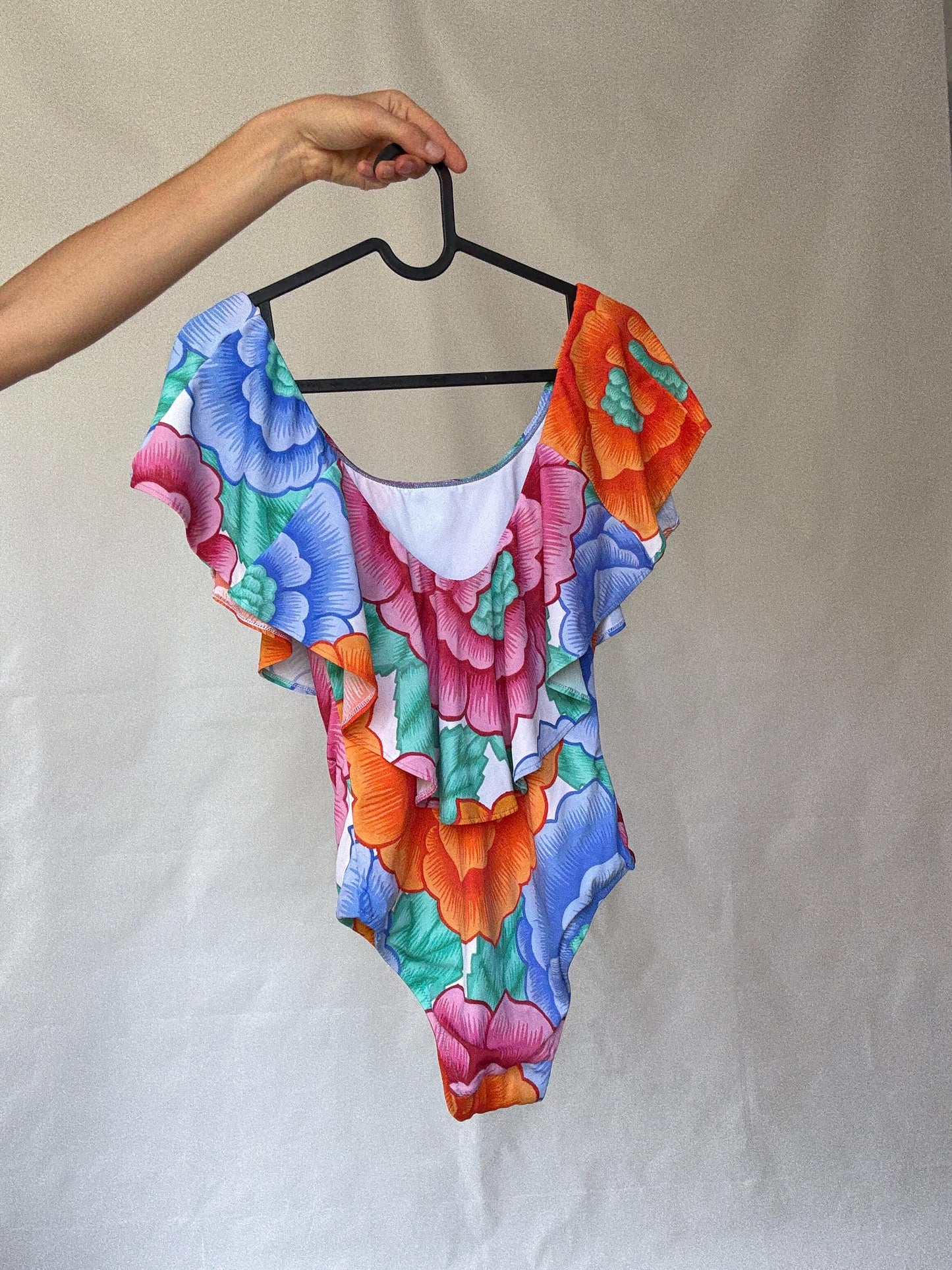 Retro floral one, piece swimsuit, scoop neckline, ruffled shoulder overlay, vibrant floral print, bohemian style, US M