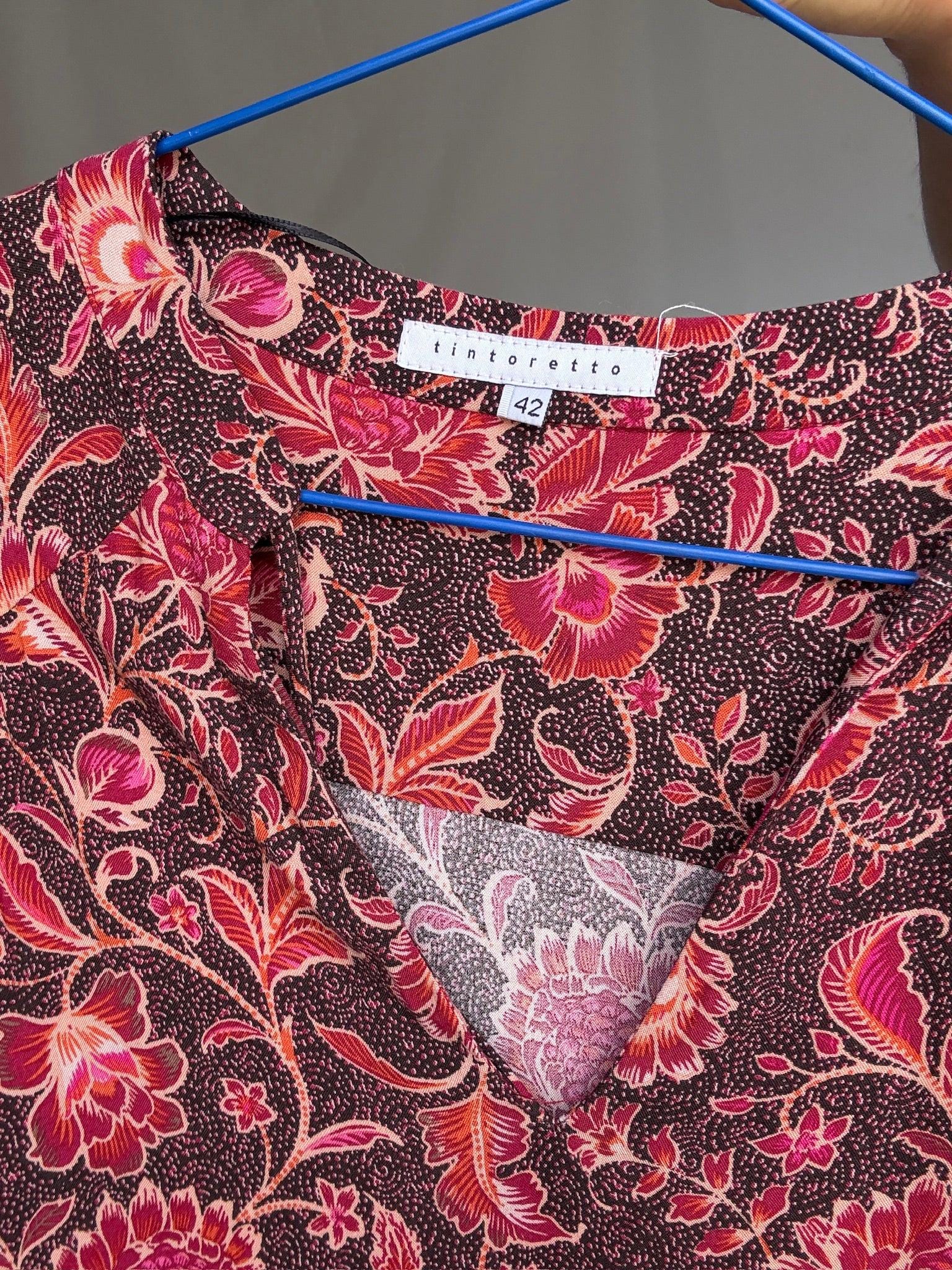 Vintage floral midi dress with tie-neck and ruffle hem US letter size M Red and pink floral print, no tag but feels like viscose