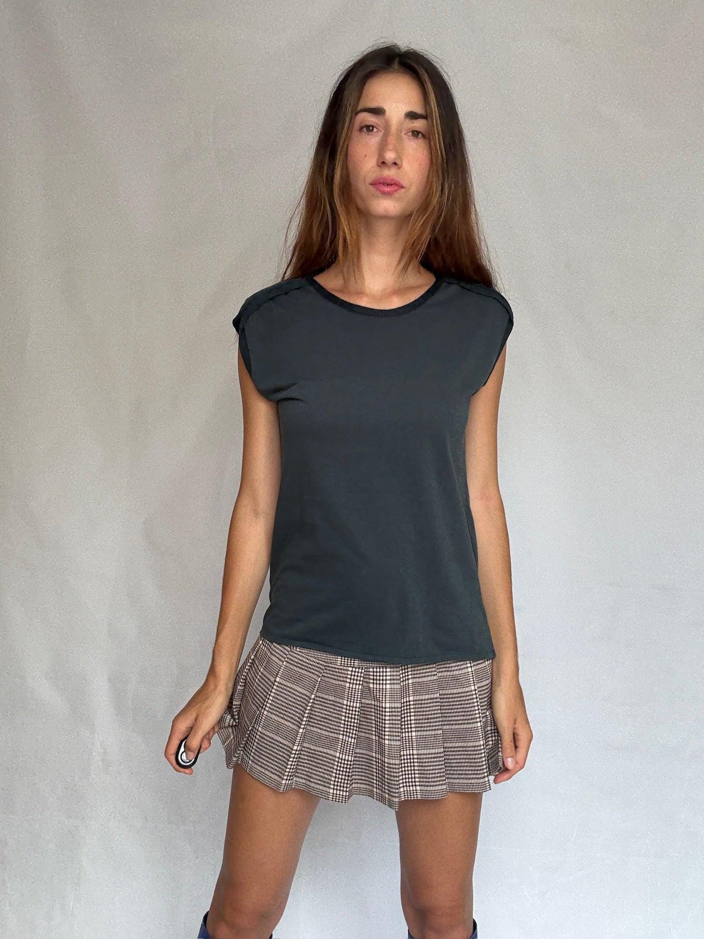 Minimalist Sleeveless Cotton Top in White — fabric close-up