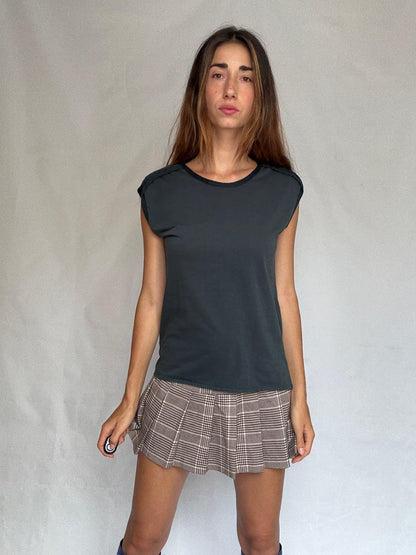 Minimalist Sleeveless Cotton Top in White — fabric close-up