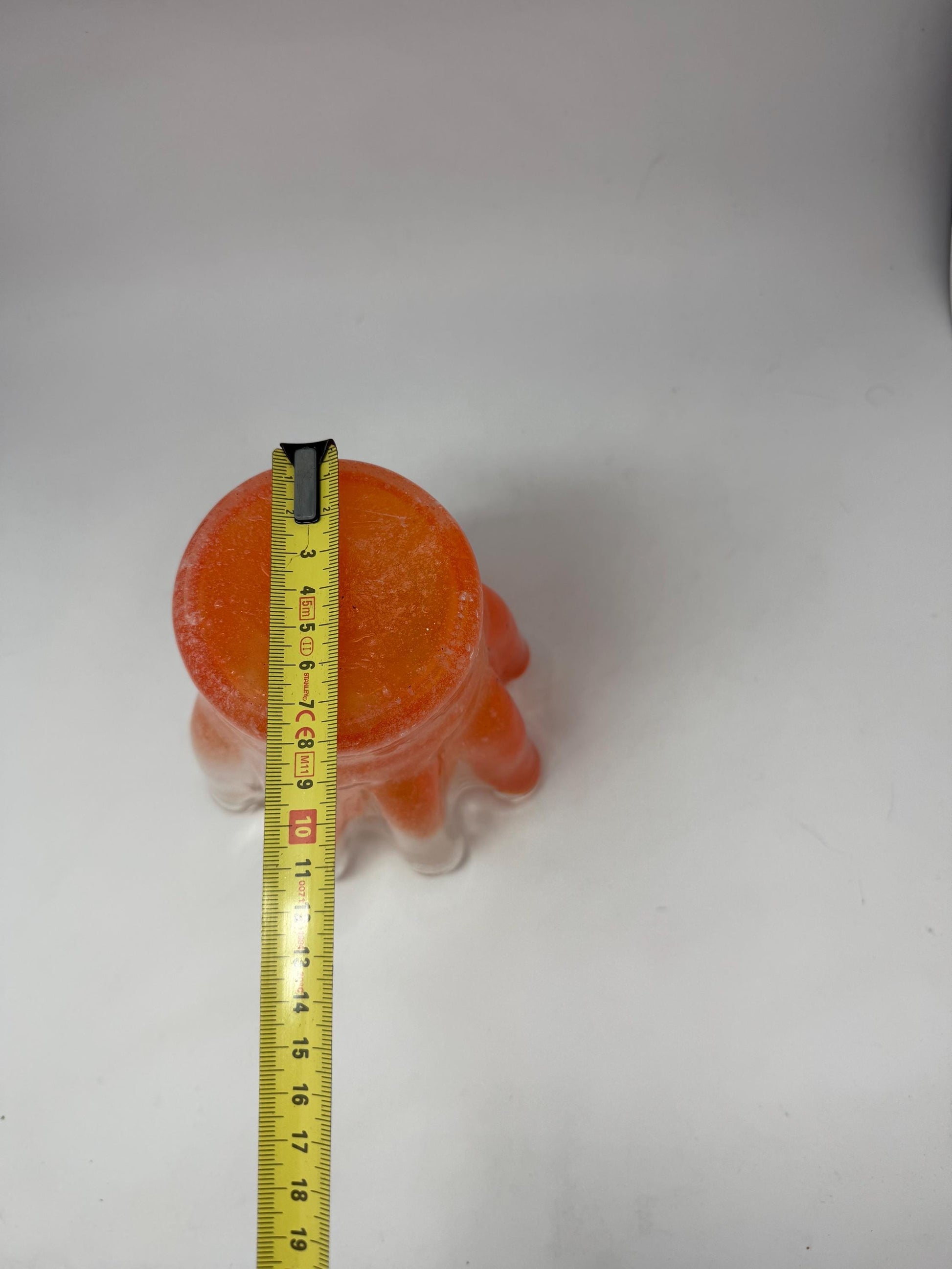 Vintage orange wavy glass vase, hand, blown, freeform design, textured frosted surface, vibrant artisanal piece, home decor accent