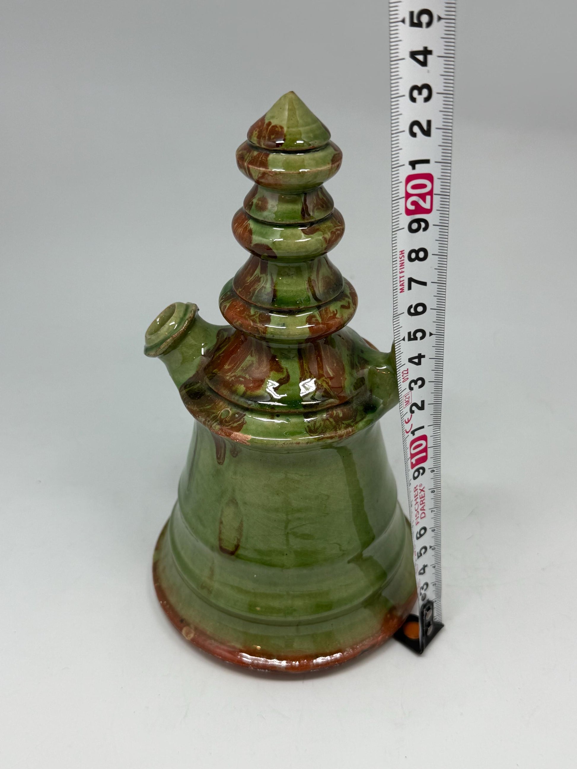 Vintage green tone ceramic pitcher, conical shape, multicolored marble glaze, unique tiered design, retro 70s decor, rustic home accent