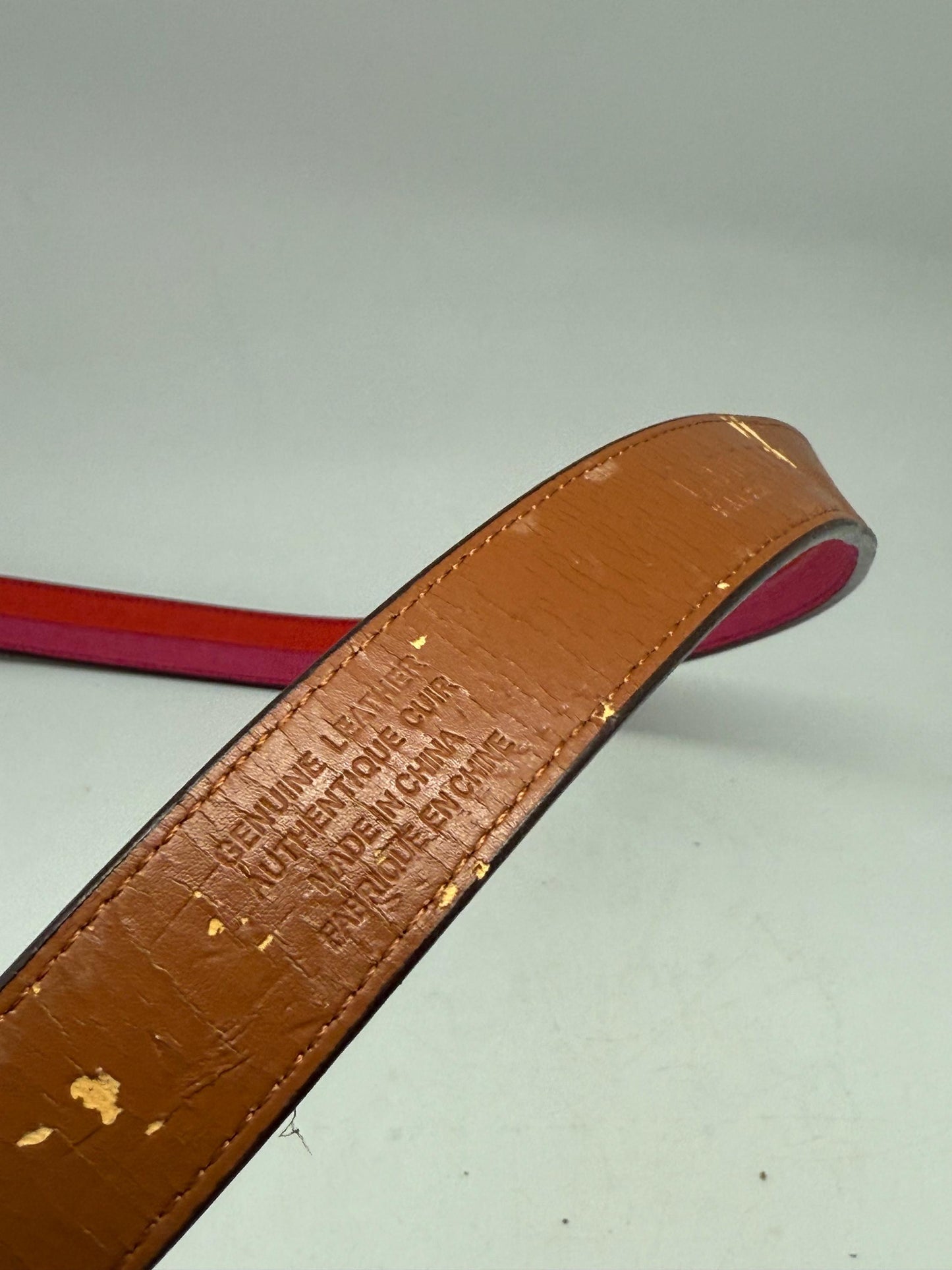 Ralph Lauren red pink leather belt, genuine leather, textured finish, silver metal buckle, branded logo detail, modern streetwear chic