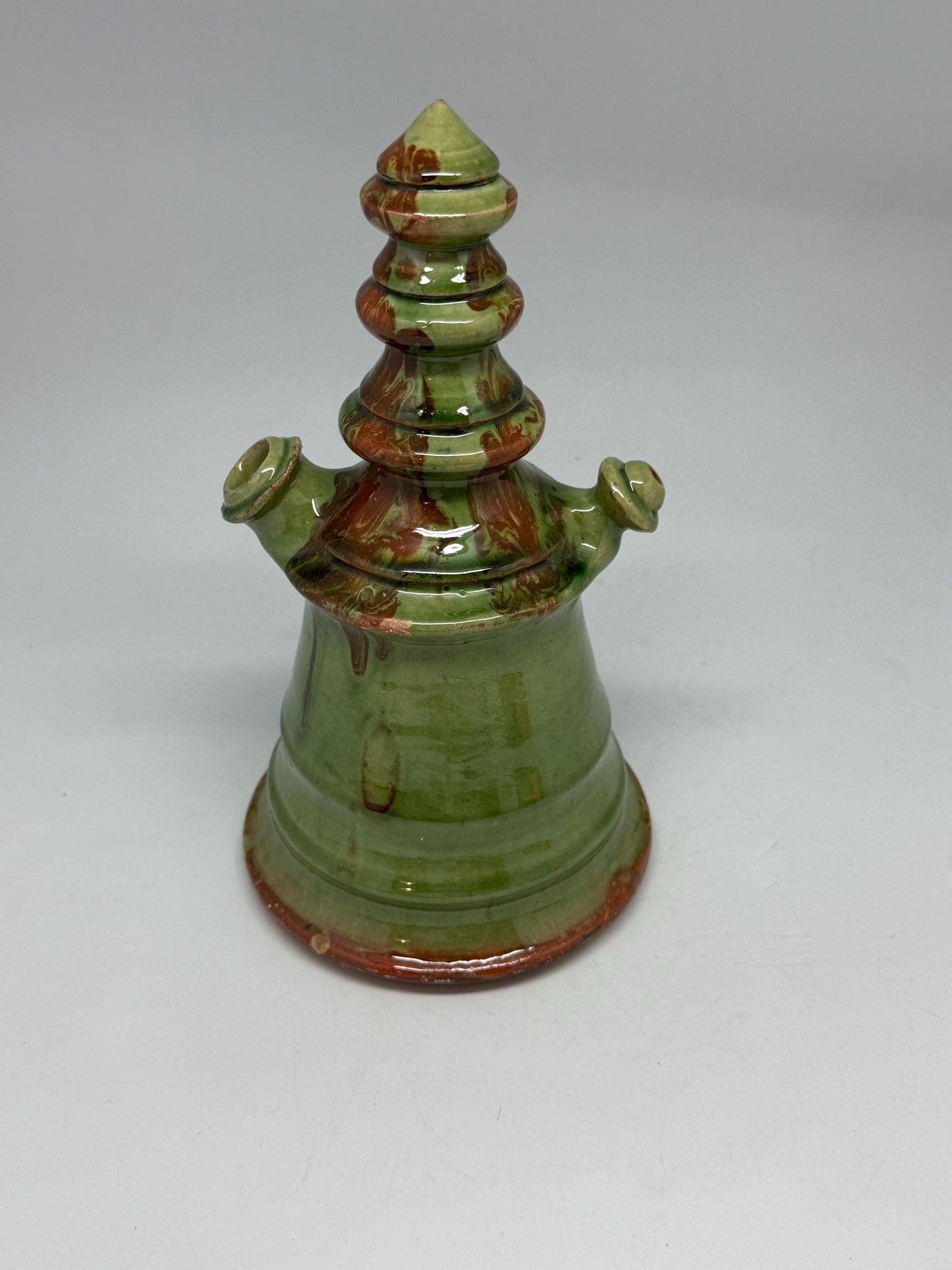 Vintage green tone ceramic pitcher, conical shape, multicolored marble glaze, unique tiered design, retro 70s decor, rustic home accent