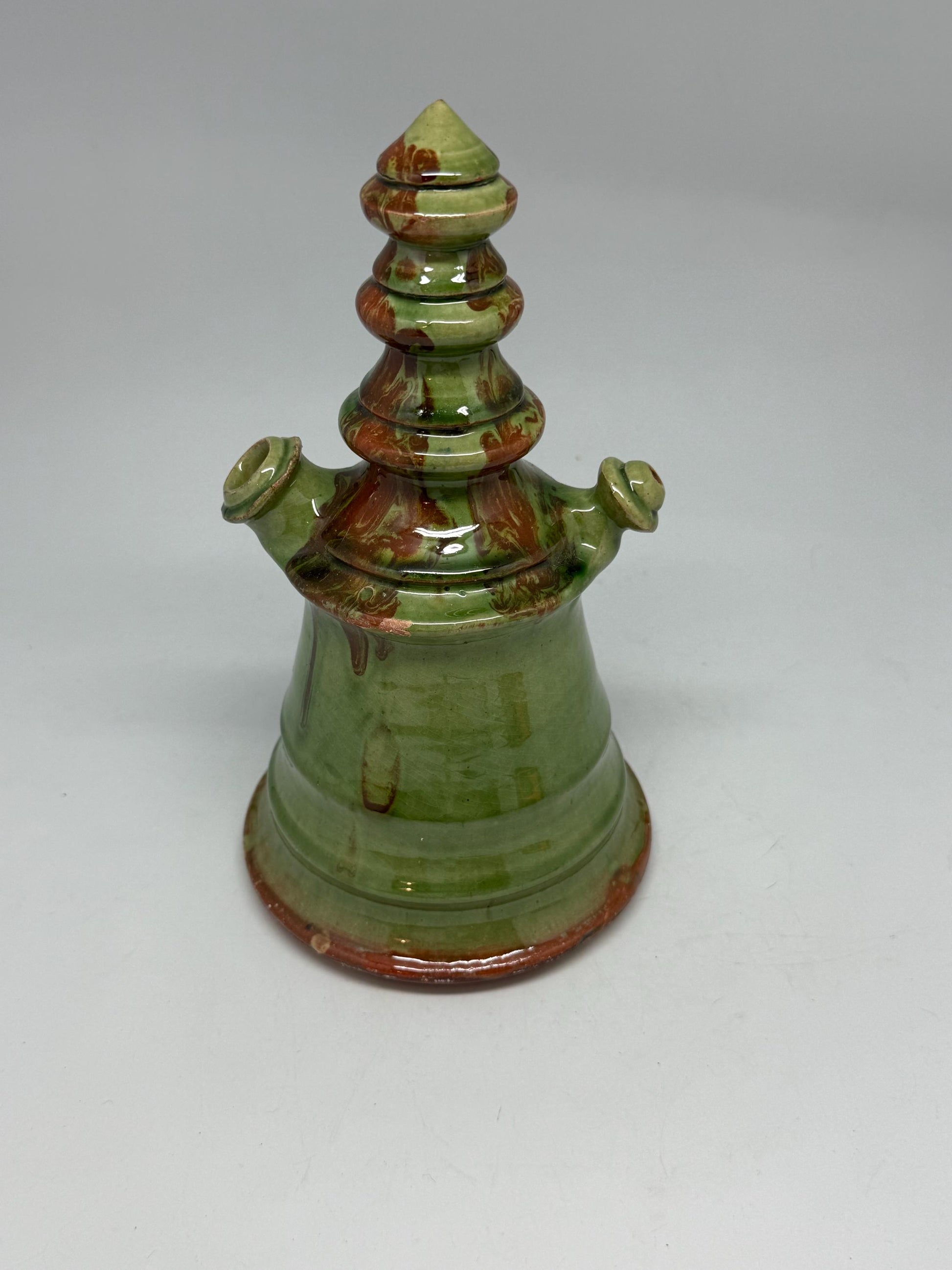 Vintage green tone ceramic pitcher, conical shape, multicolored marble glaze, unique tiered design, retro 70s decor, rustic home accent