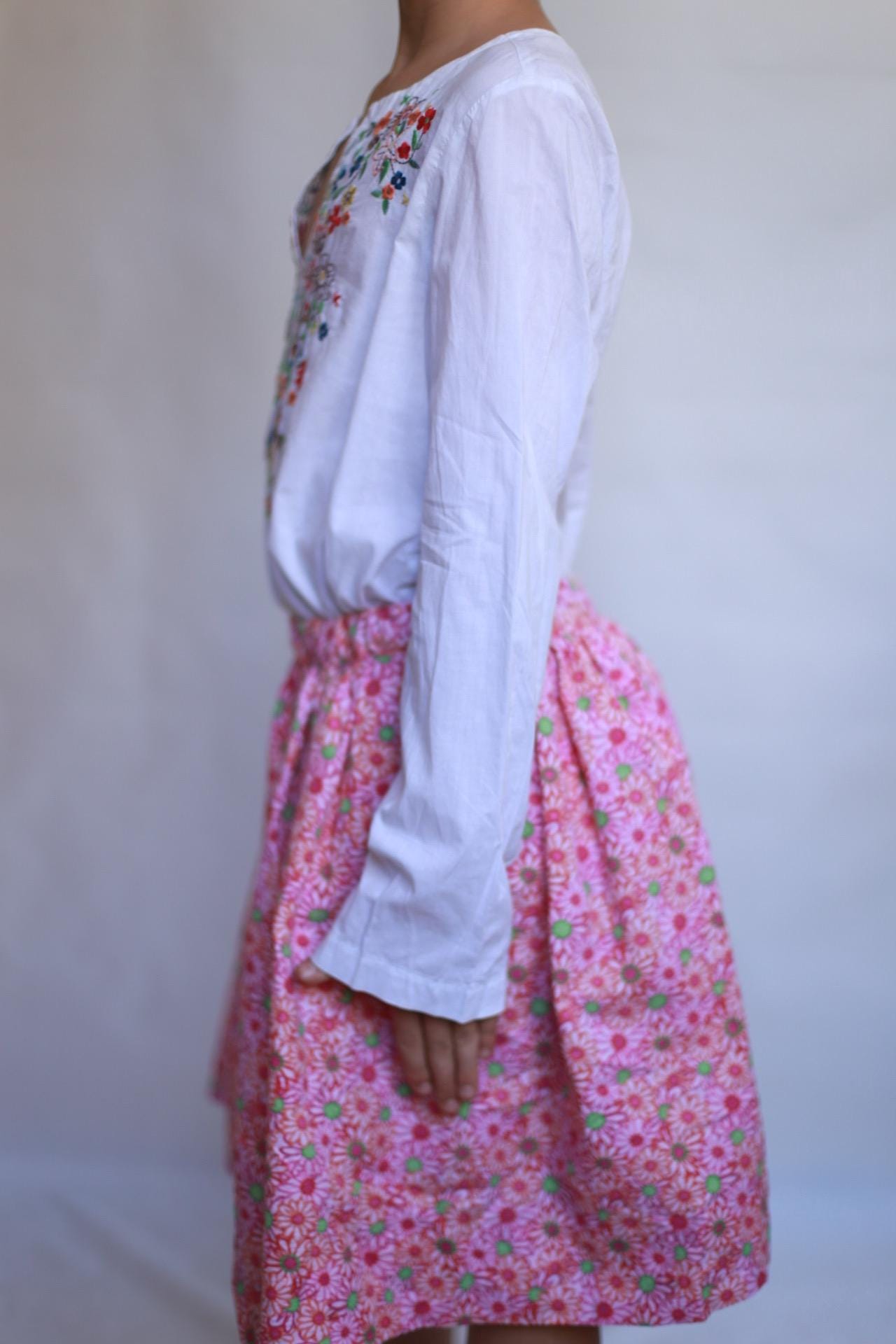 Vintage white children's blouse, cotton feel, relaxed fit, hand embroidered detail, minimalist folkloric aesthetic, US 10, EU 154 kids