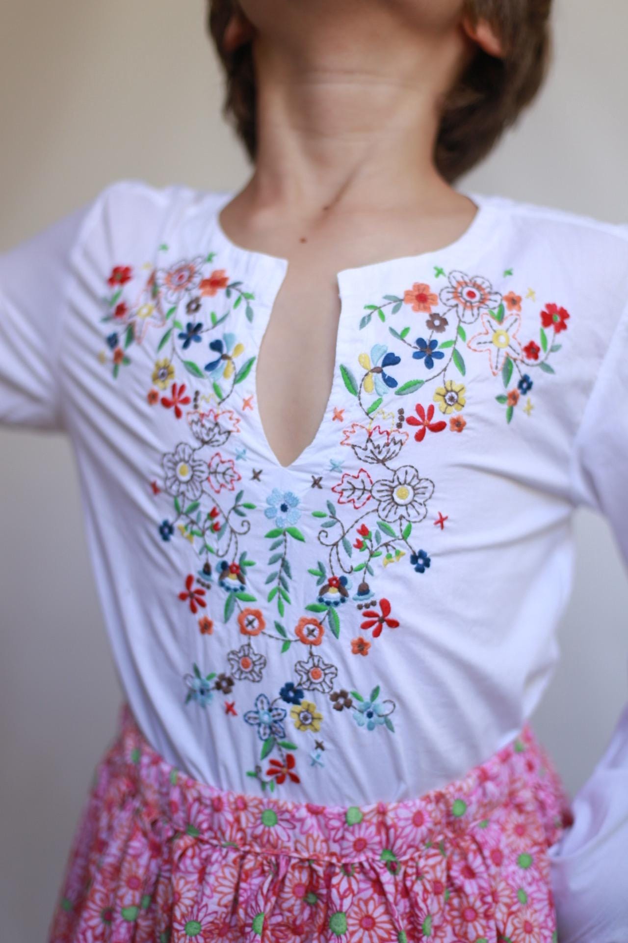 Vintage white children's blouse, cotton feel, relaxed fit, hand embroidered detail, minimalist folkloric aesthetic, US 10, EU 154 kids