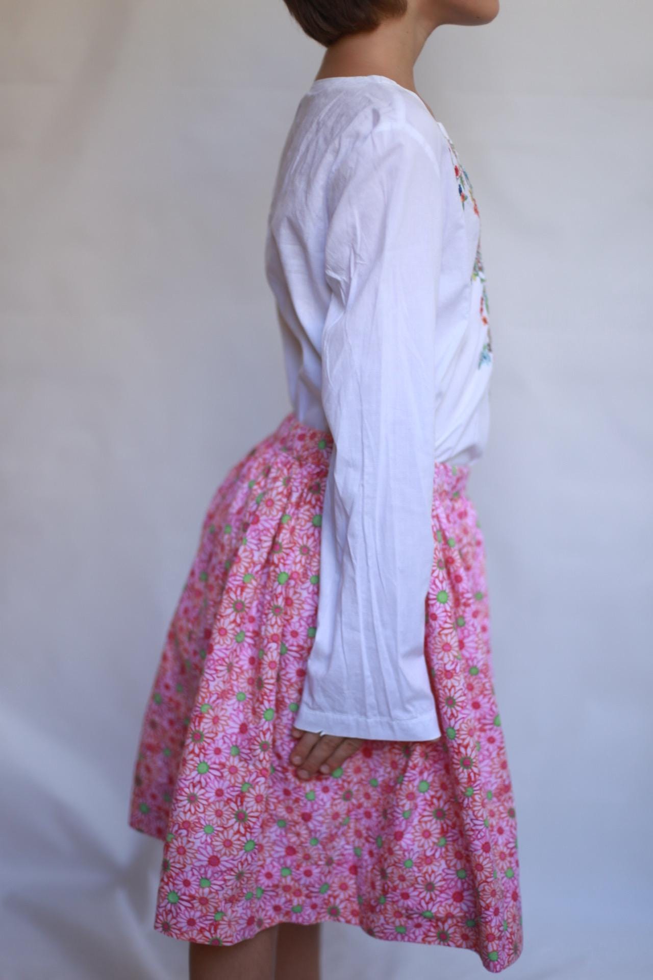 Vintage white children's blouse, cotton feel, relaxed fit, hand embroidered detail, minimalist folkloric aesthetic, US 10, EU 154 kids