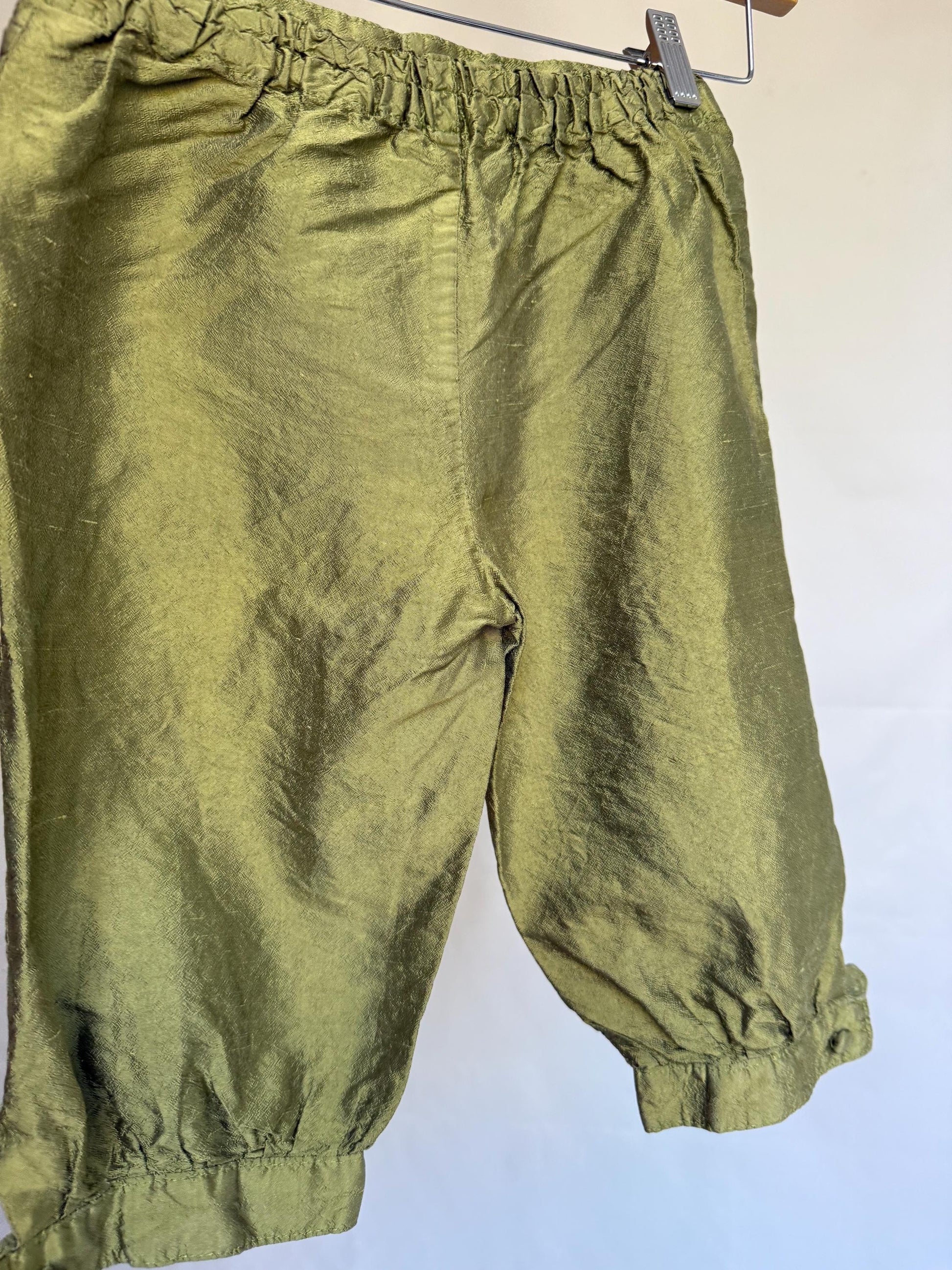 Elvira Nieto olive green silk cropped pants, adjustable hem detail, elegant minimalism, US 4, chic casual
