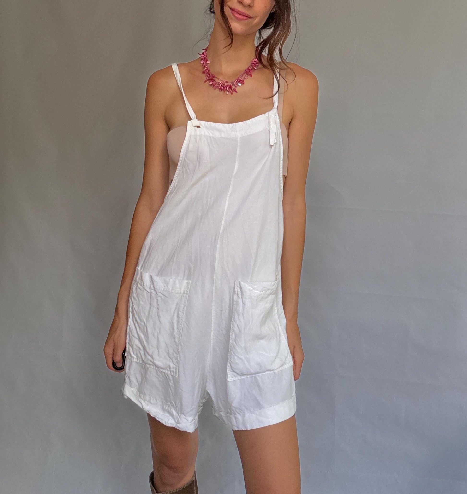 White sleeveless jumpsuit, US L, relaxed casual style