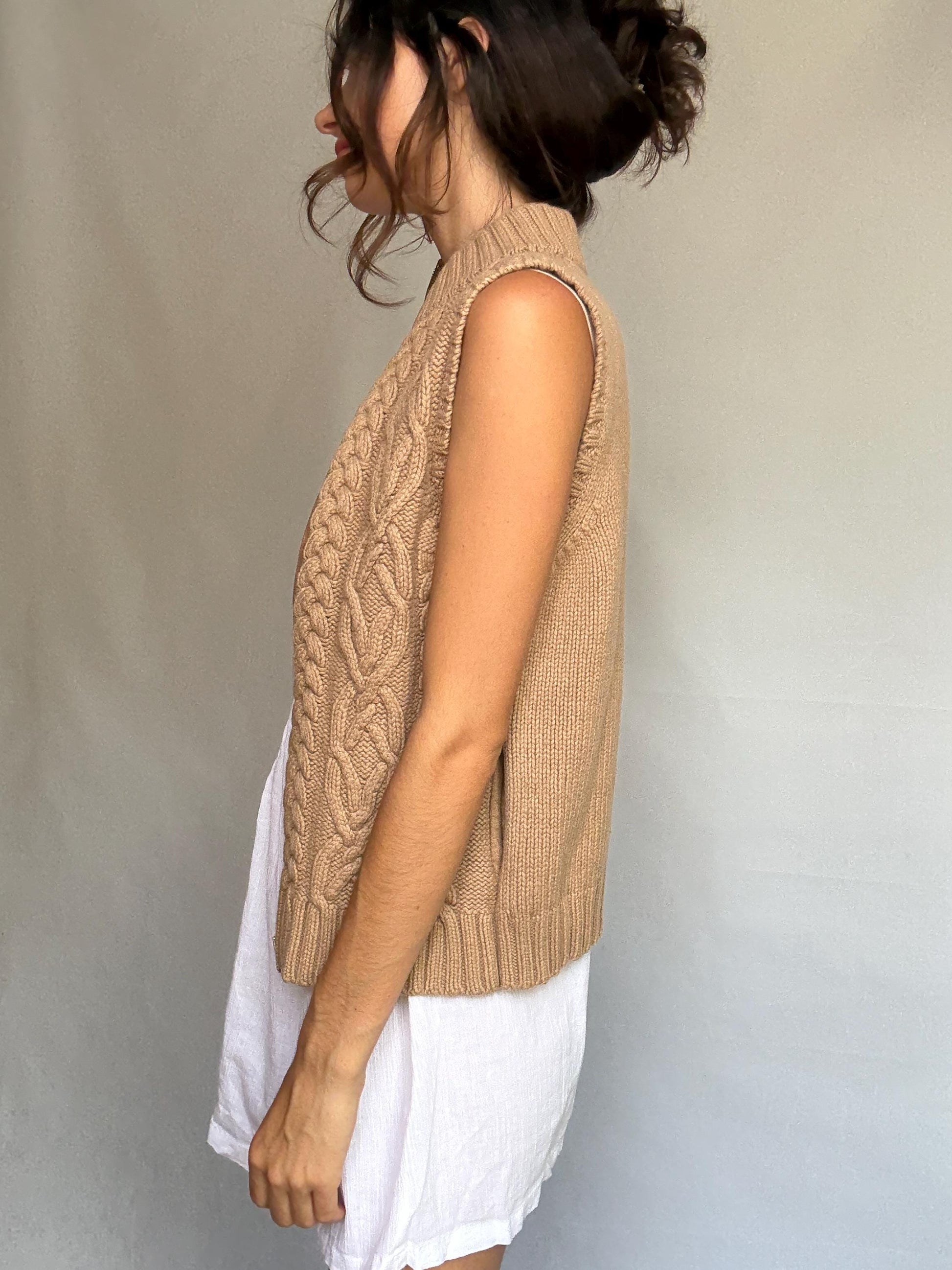 Massimo Dutti beige knit vest, wool Italian yarn, fitted silhouette, cable knit pattern, high ribbed collar, elegant Timothée Chalamet vibe