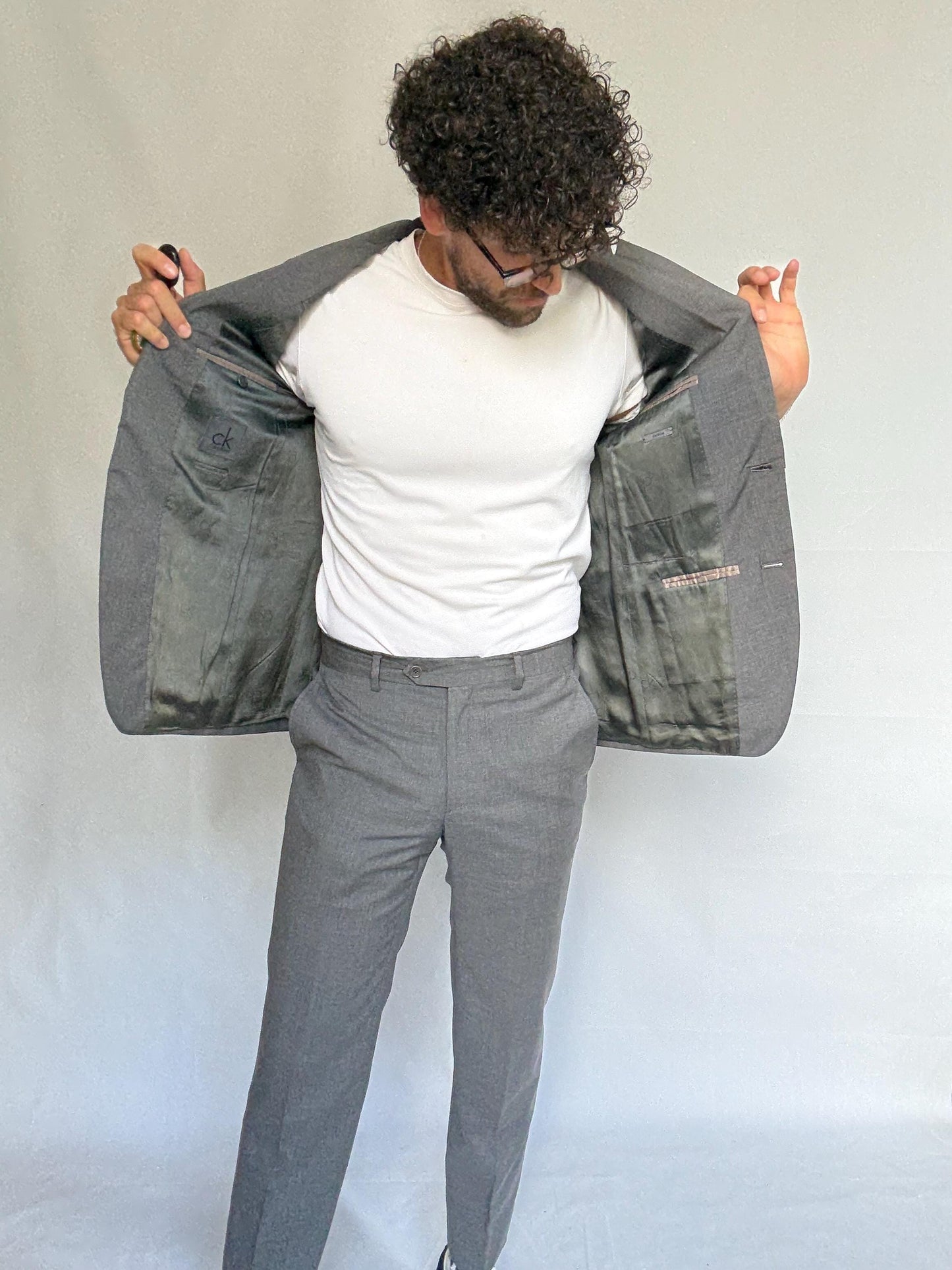 Calvin Klein gray suit, 100% wool, tailored fit, two, button blazer, slim fit trousers, minimalist elegant, US M, formal office wear